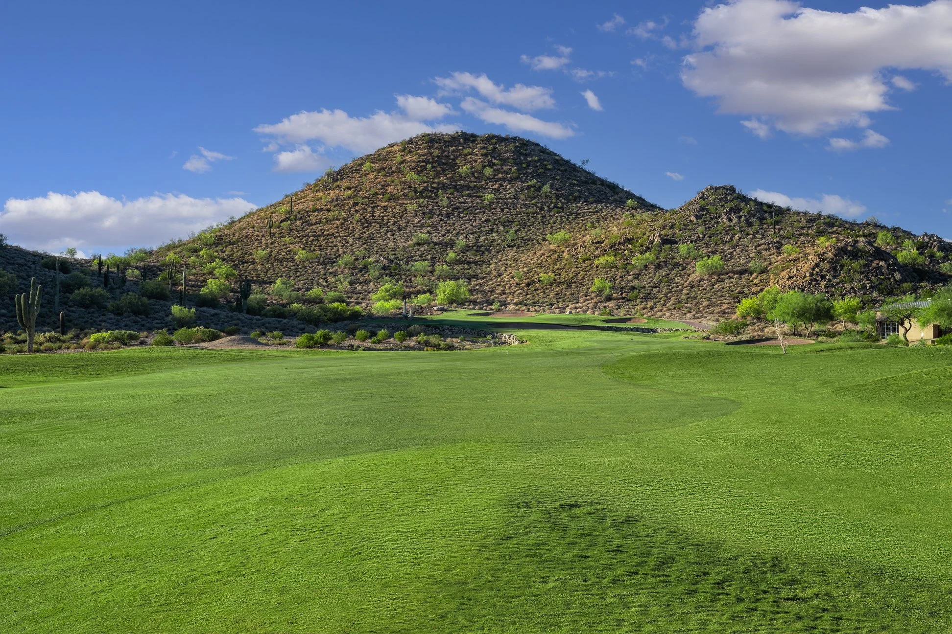 View of a desert mountain and fairway on the 12th hole at San Tan Highlands Golf Club in San Tan Valley, Arizona.