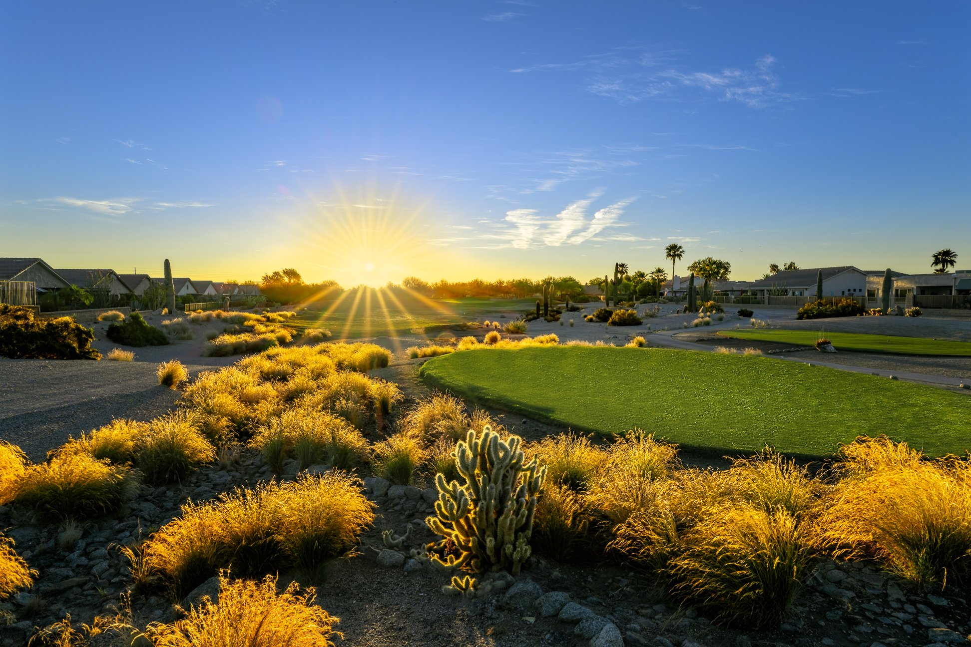 Sunrise over the tee boxes at San Tan Highlands Golf Club in San Tan Valley, Arizona.