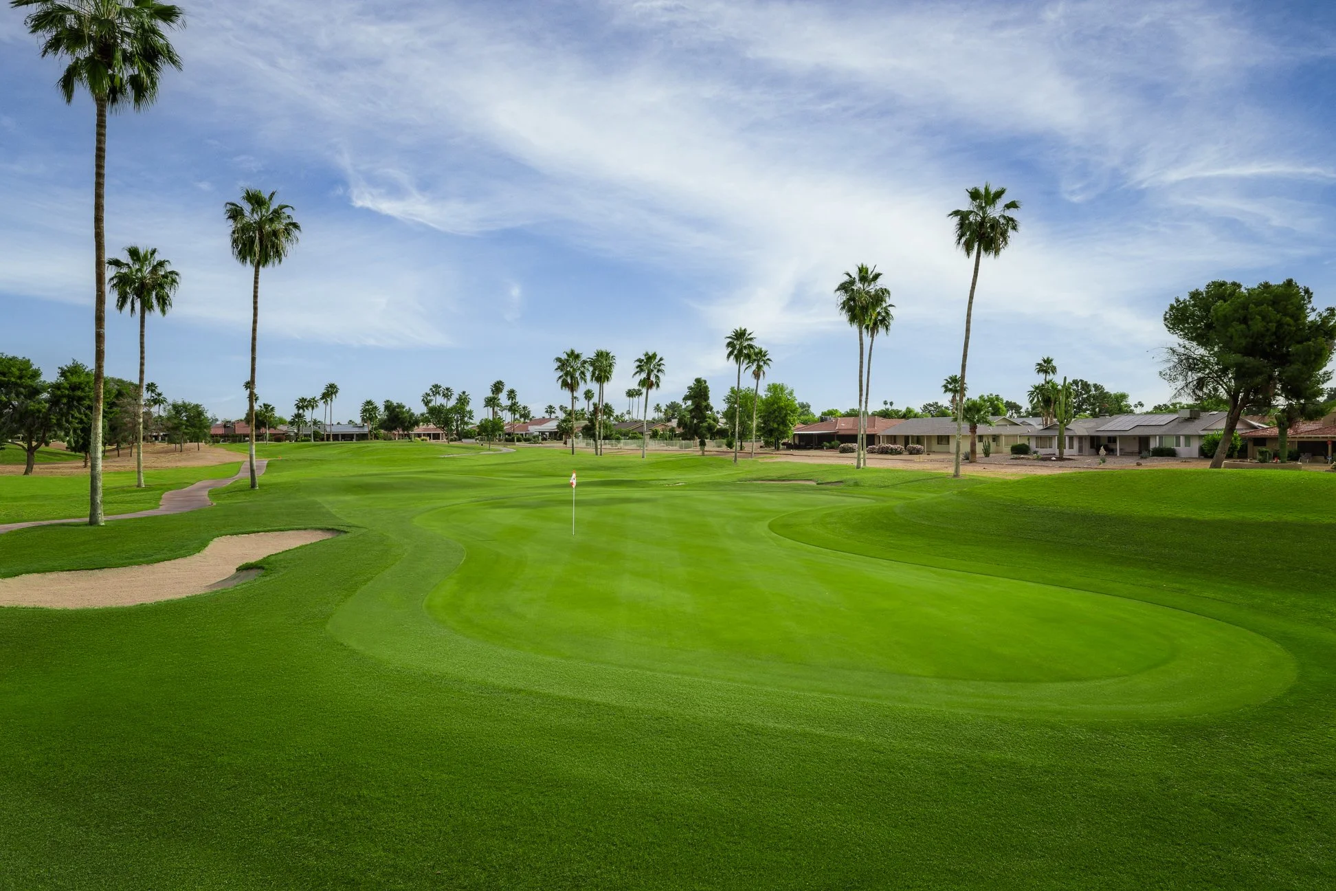 View from the fairway of the 7th hole on the golf course at Briarwood Country Club in Sun City West Arizona