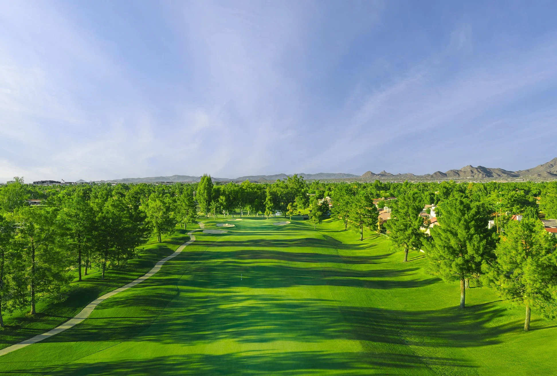 Scenic aerial view of a lush green fairway on the 3rd hole at Scottsdale Country Club in Scottsdale, Arizona.