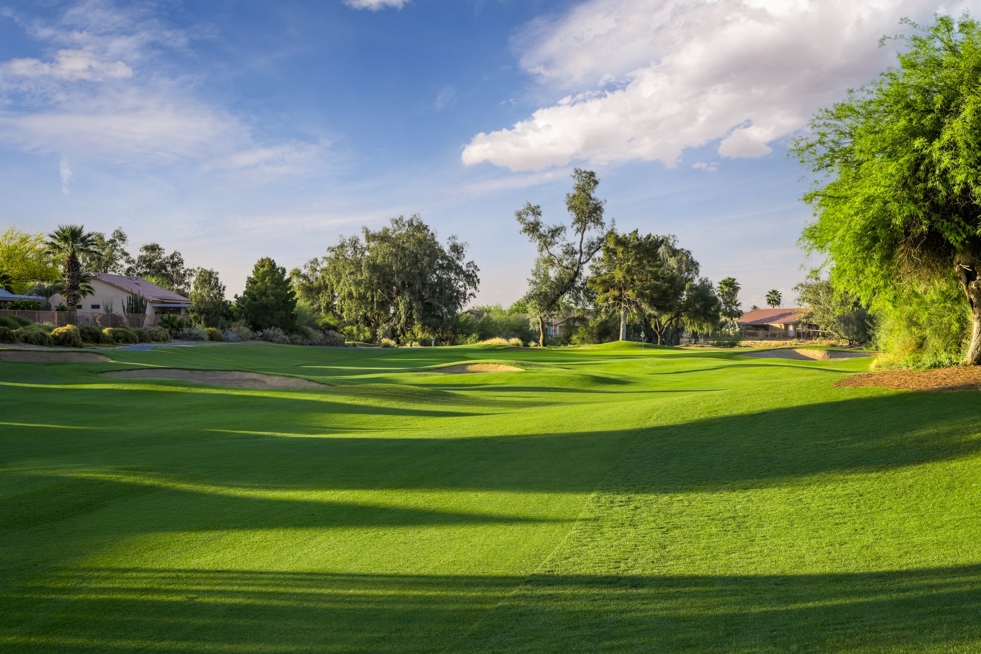 View of the fairway on the 7th hole of Coyote Lakes Golf Club in Surprise, Arizona.