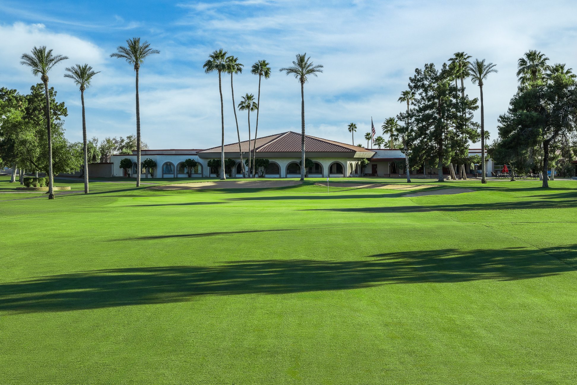 View of the 18th fairway and clubhouse at Union Hills Golf Club in Sun City, Arizona.