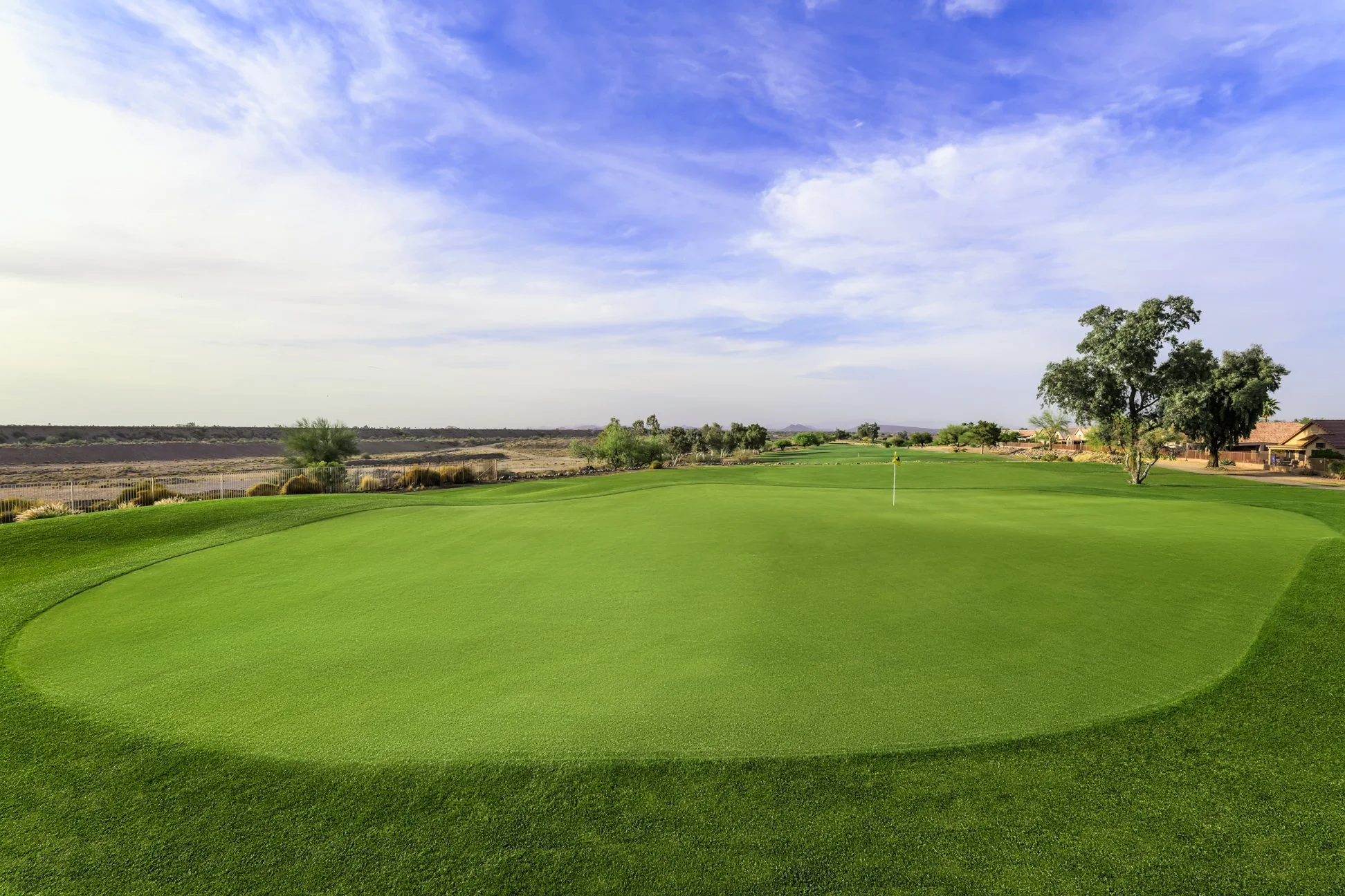 View from the putting green of the 6th hole at Coyote Lakes Golf Club in Surprise, Arizona.