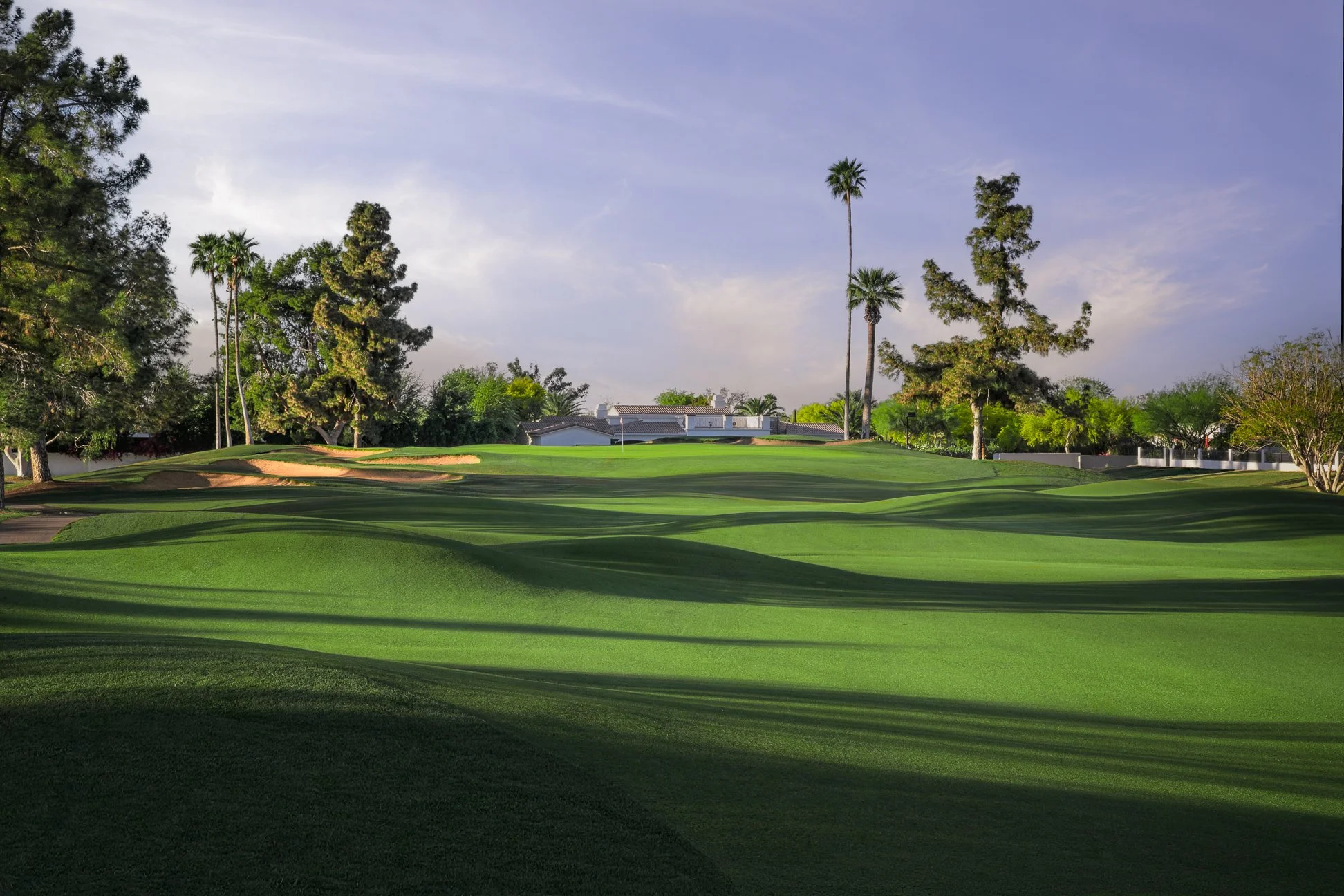 A scenic view of the 7th hole and surrounding houses at Scottsdale Country Club in Scottsdale, Arizona.