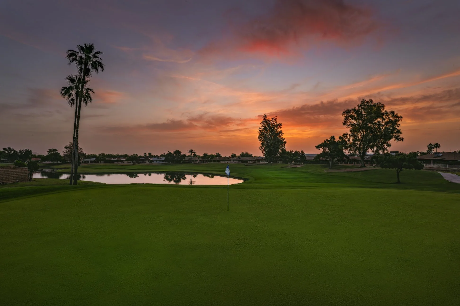 Pink sunrise over the golf course at Union Hills Golf Club in Sun City, Arizona.