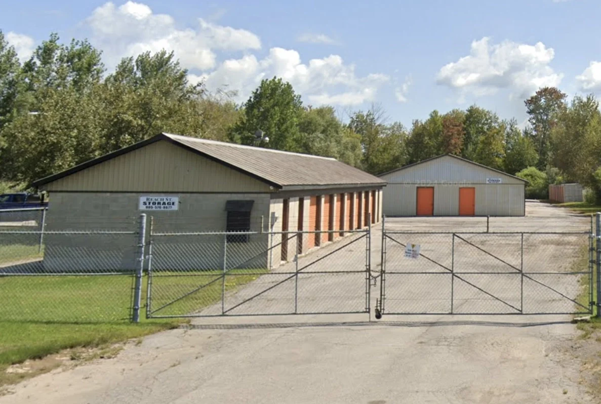Self serve storage units behind a fence and locked gate, located in Port Perry on Reach street