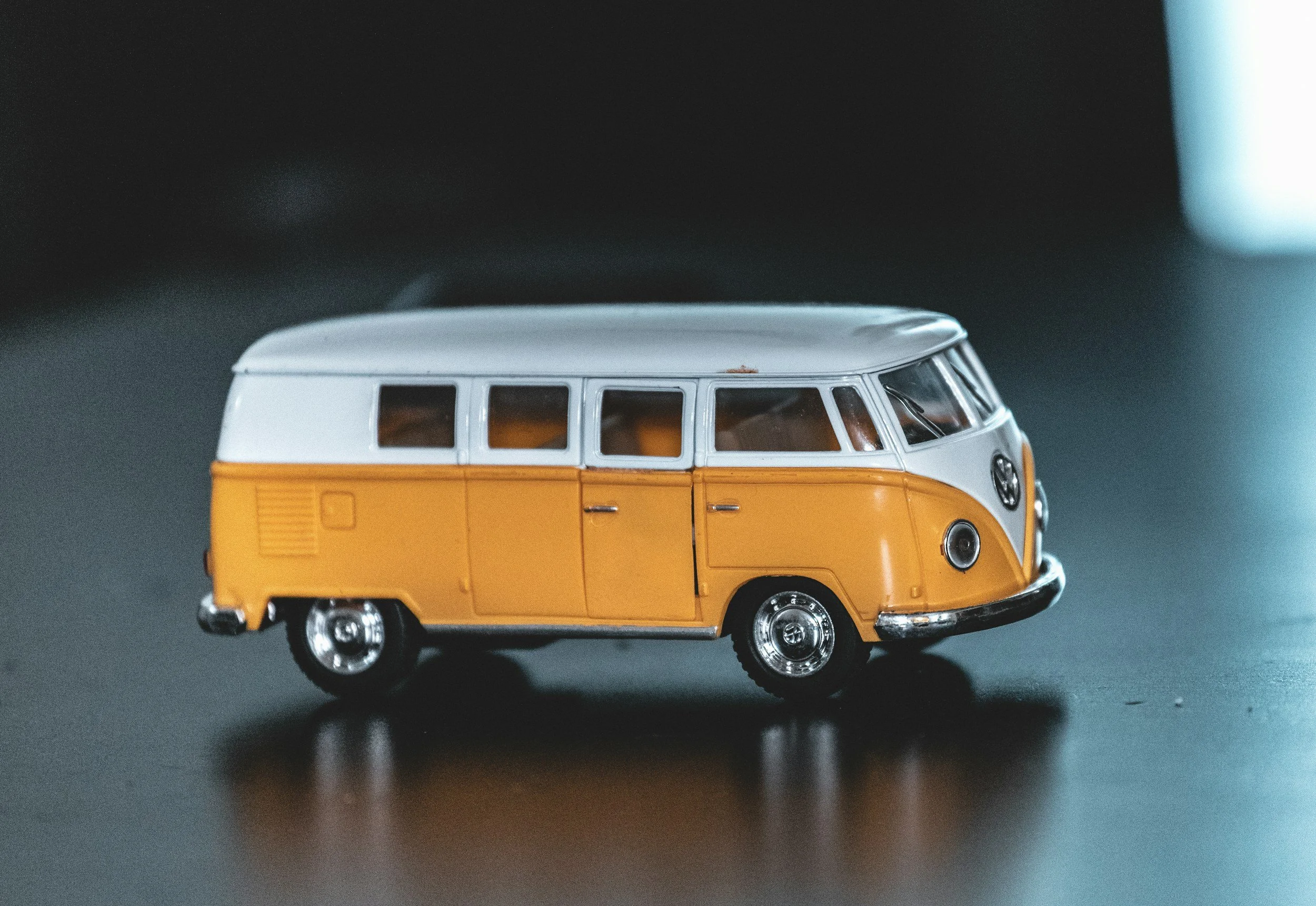Yellow and white toy VW mini bus