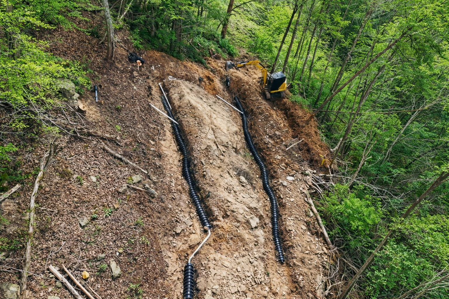 Underground utility installation and trenching for water and sewer systems in East Tennessee