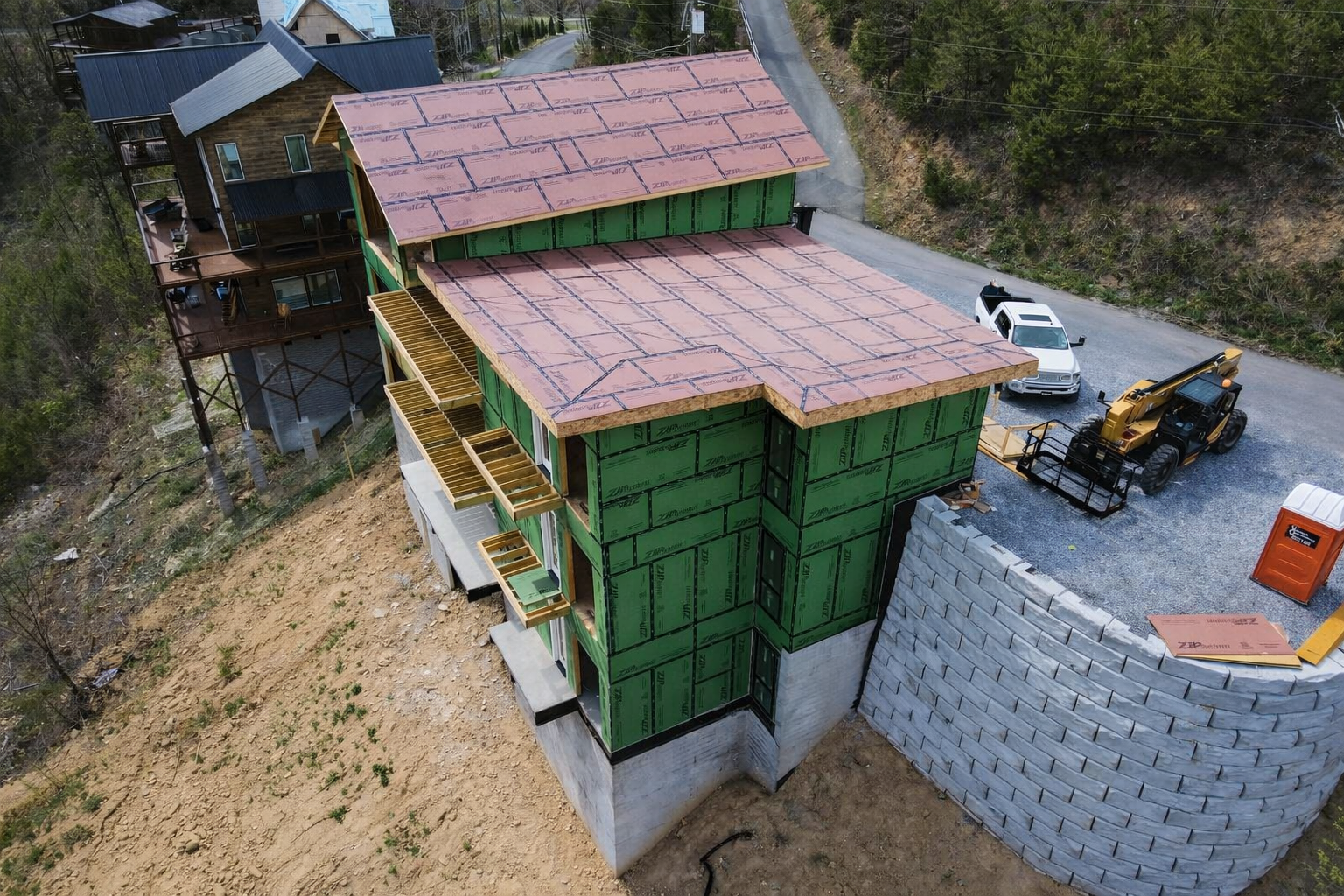 Hillside home construction with structural framing in the Smoky Mountains Tennessee.