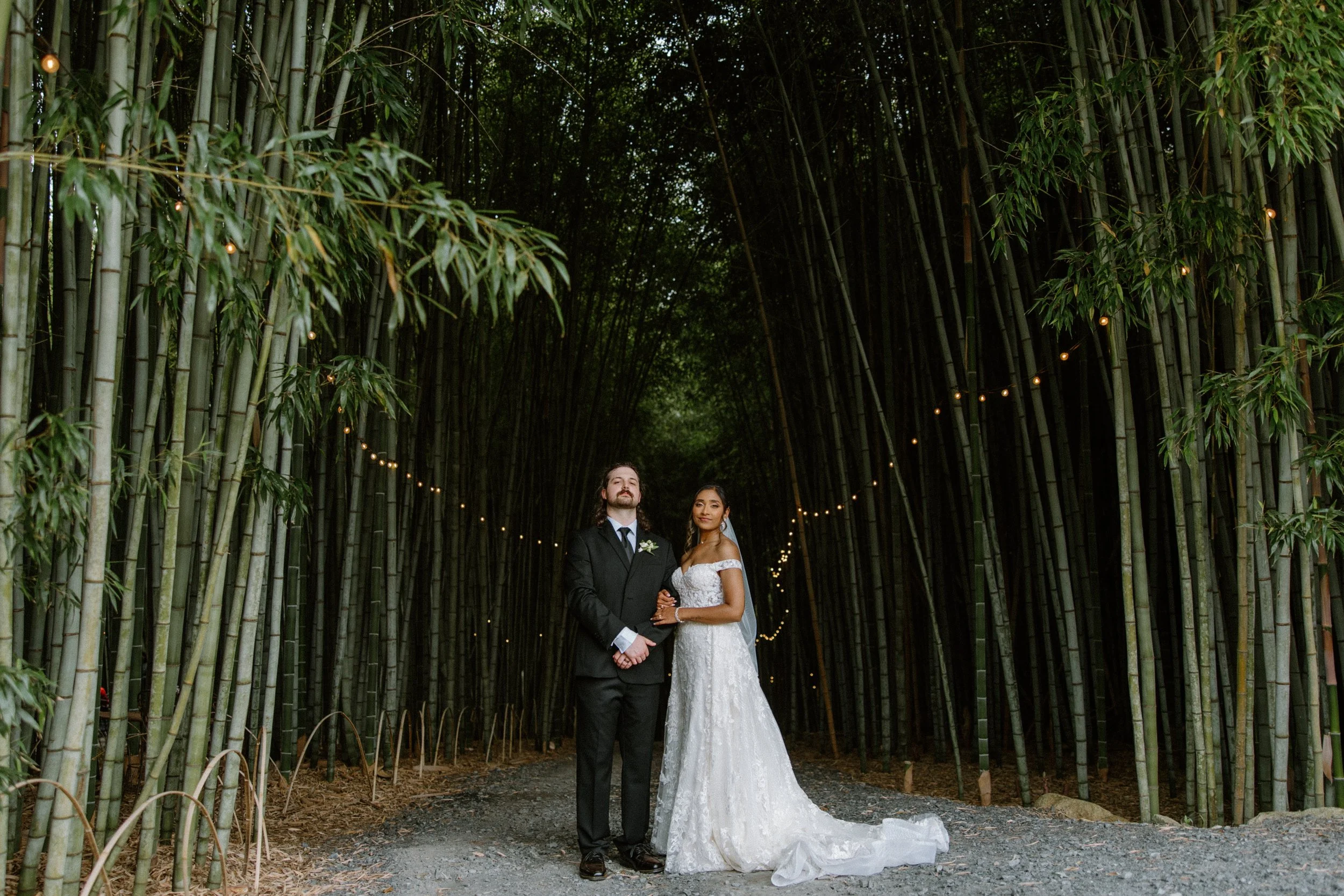 Bride and groom portraits at Camelot Meadows wedding venue bamboo forest