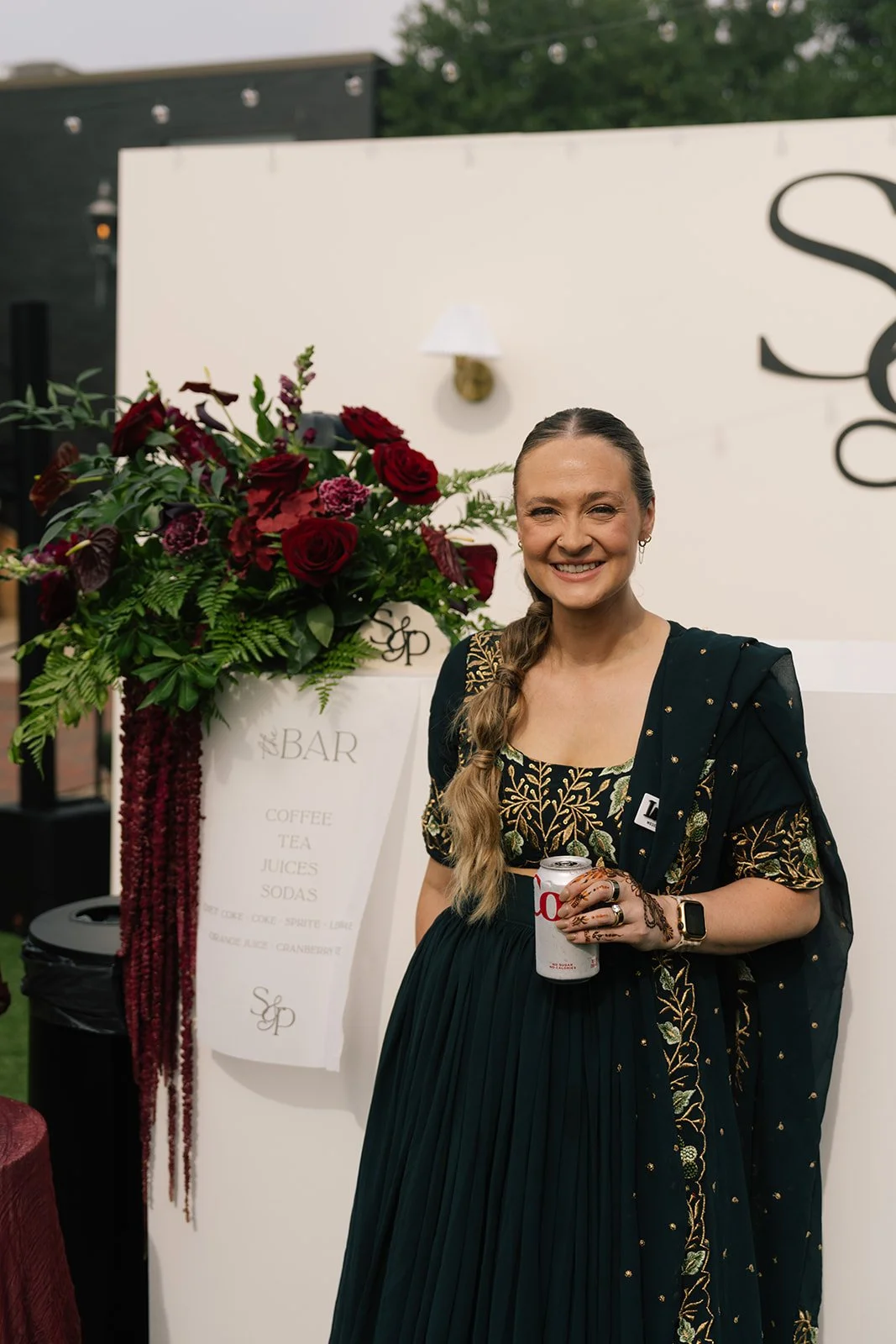 Isabel of The Yellow rose Weddings posing at Charlotte reception