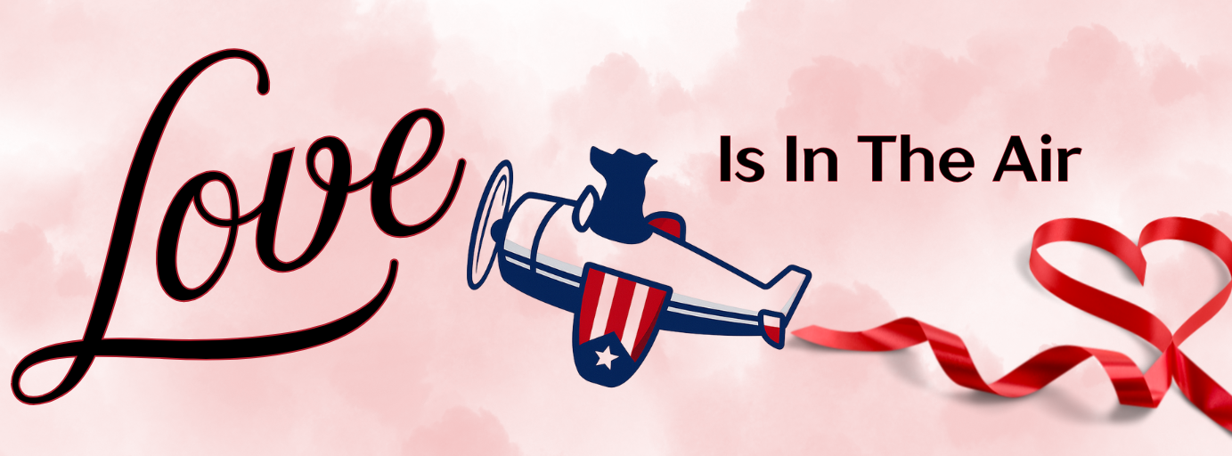 A graphic with the words 'Love is in the air' with a helicopter carrying a heart-shaped ribbon.