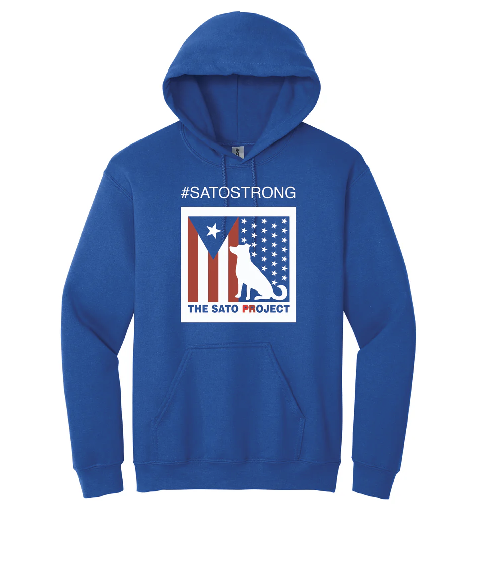 Blue hoodie with graphics supporting the Sato Project, featuring an American flag, a dog silhouette, and text '#SATOSTRONG' and 'THE SATO PROJECT'.