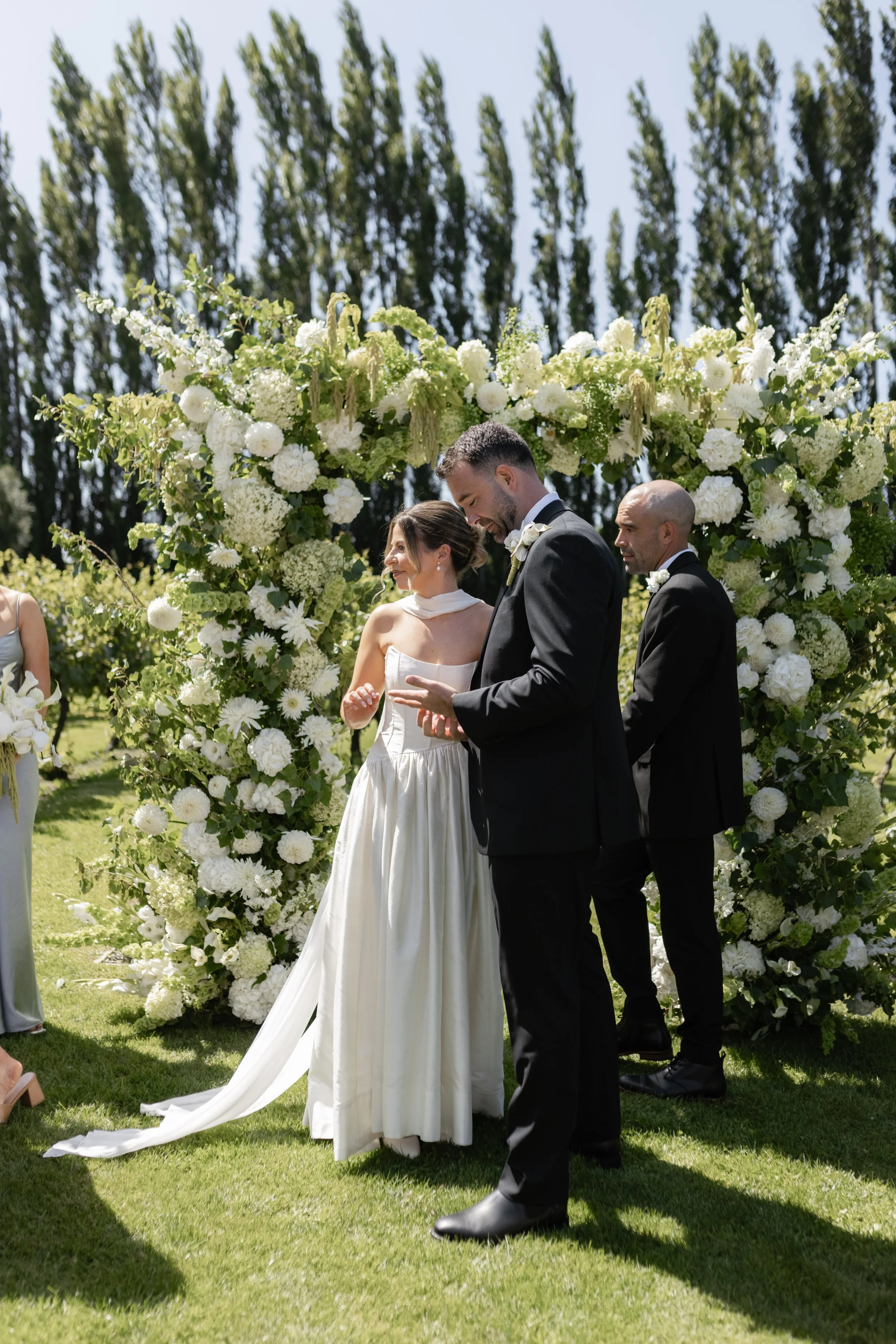 White and green floral arch installation