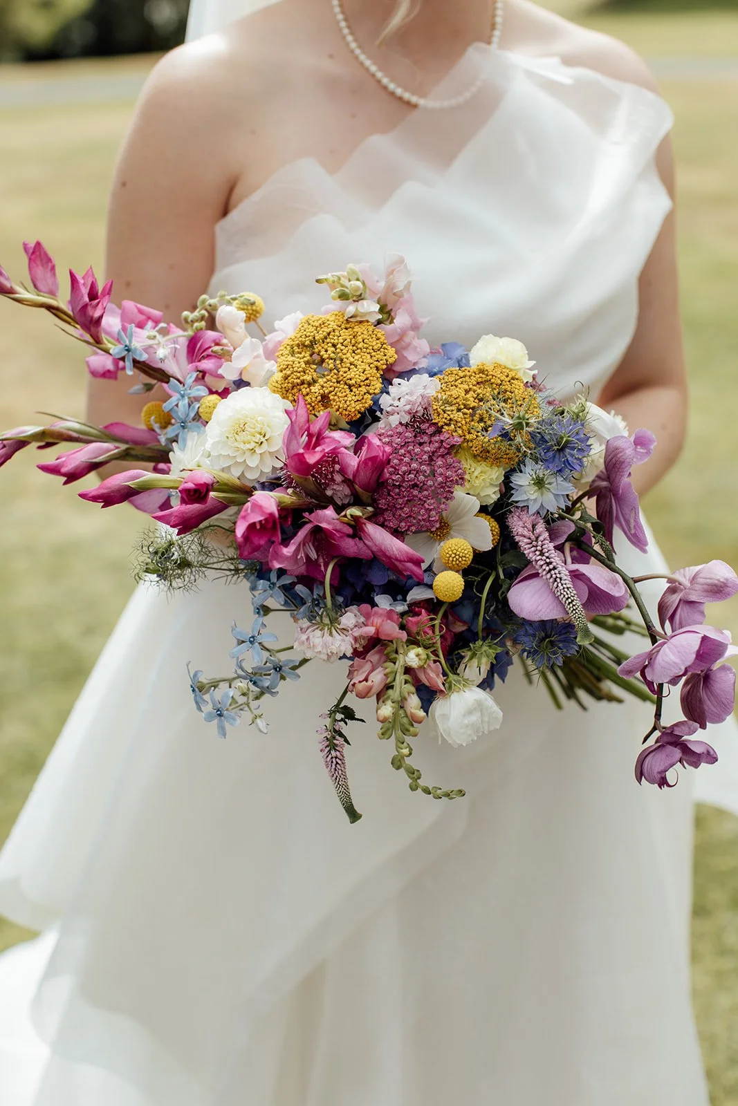 Structural bright blue and purple wedding bouquet