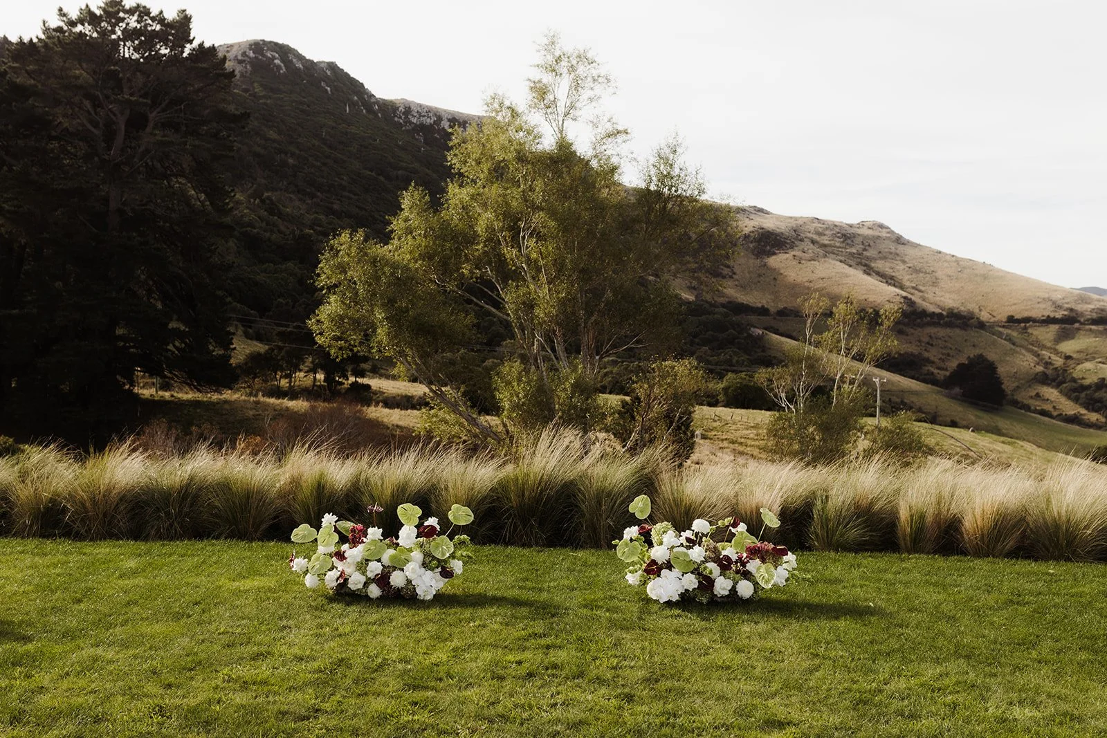 Red white and green ceremony flowers