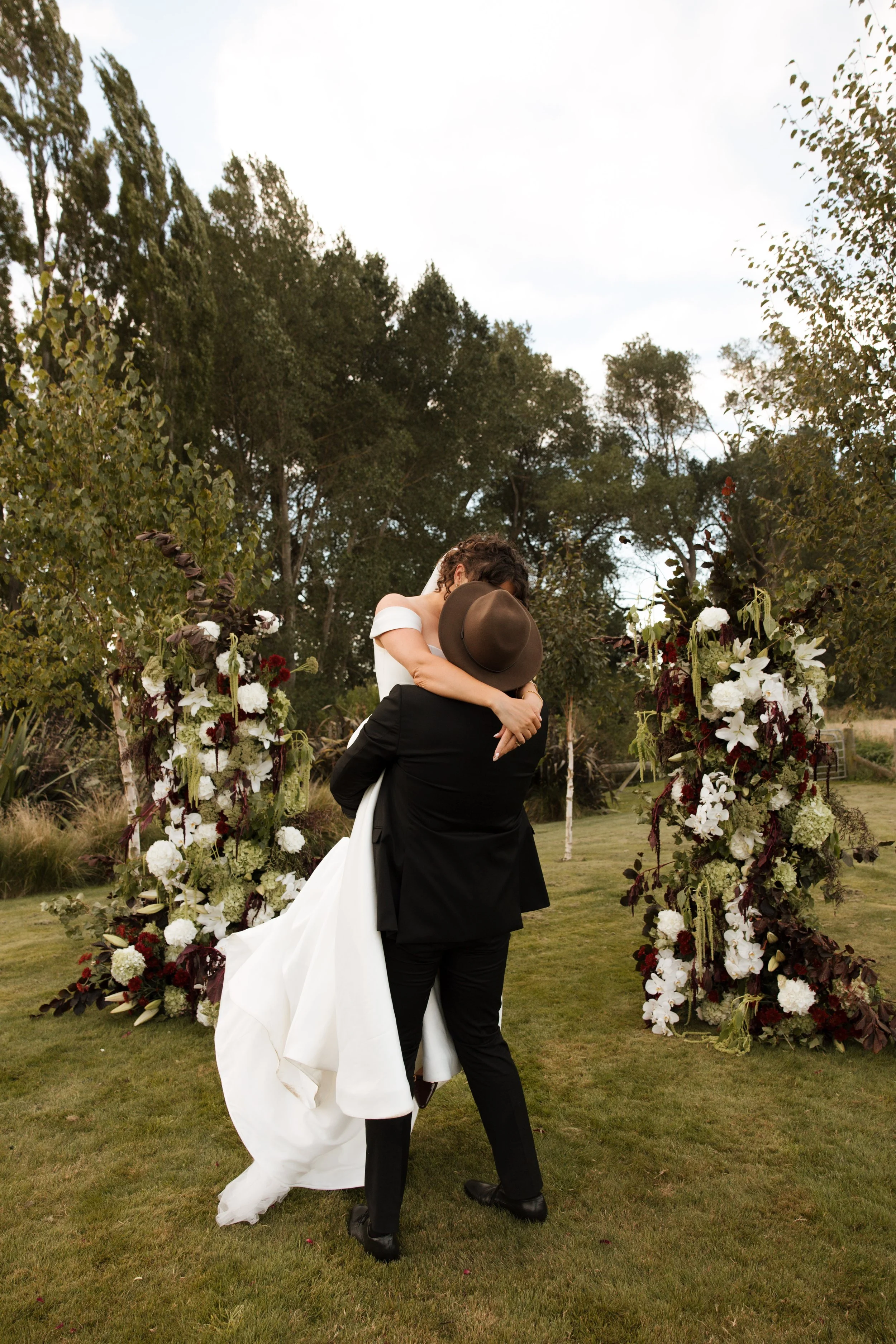 Floral pillars wedding installation