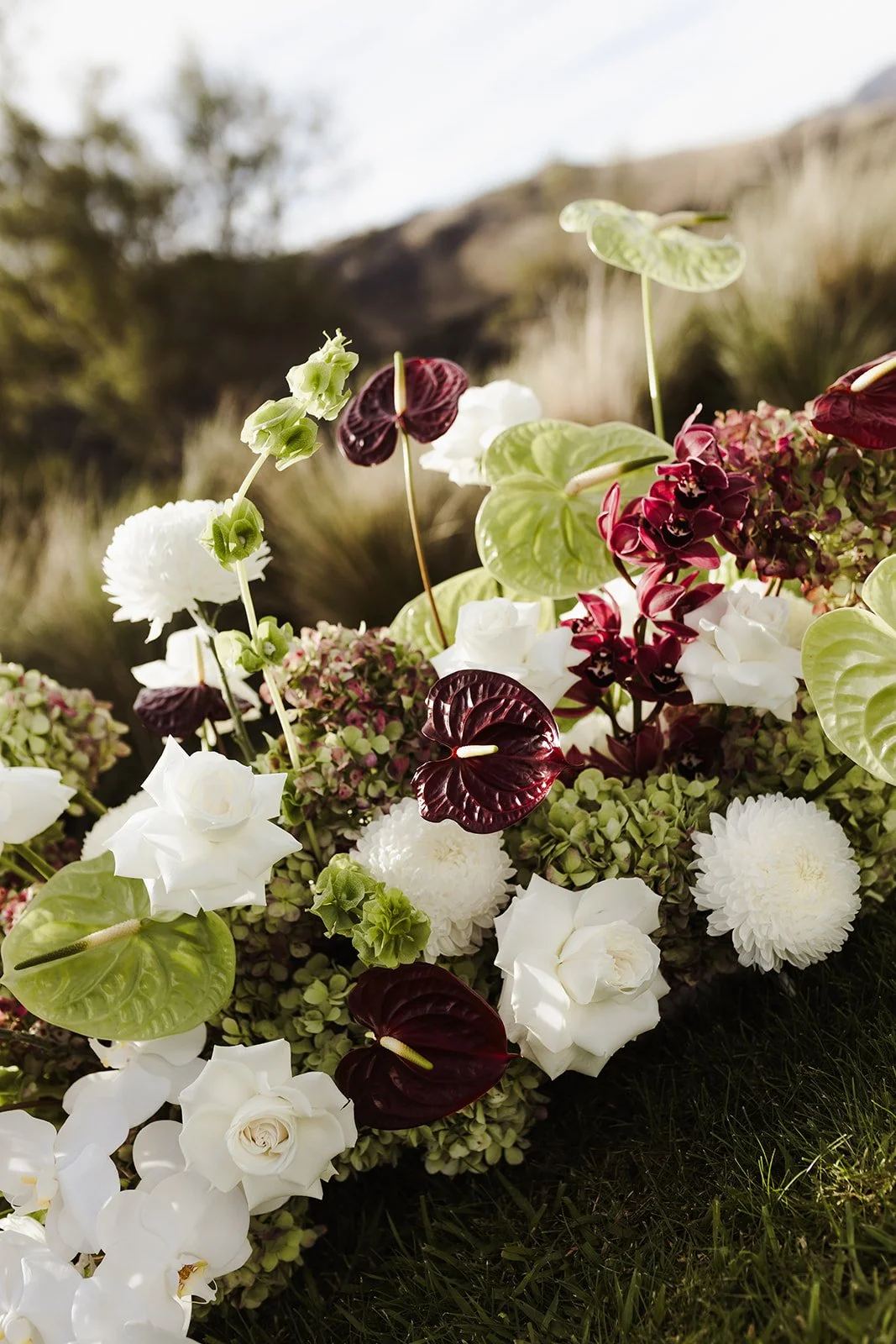 Red white and green ceremony flowers