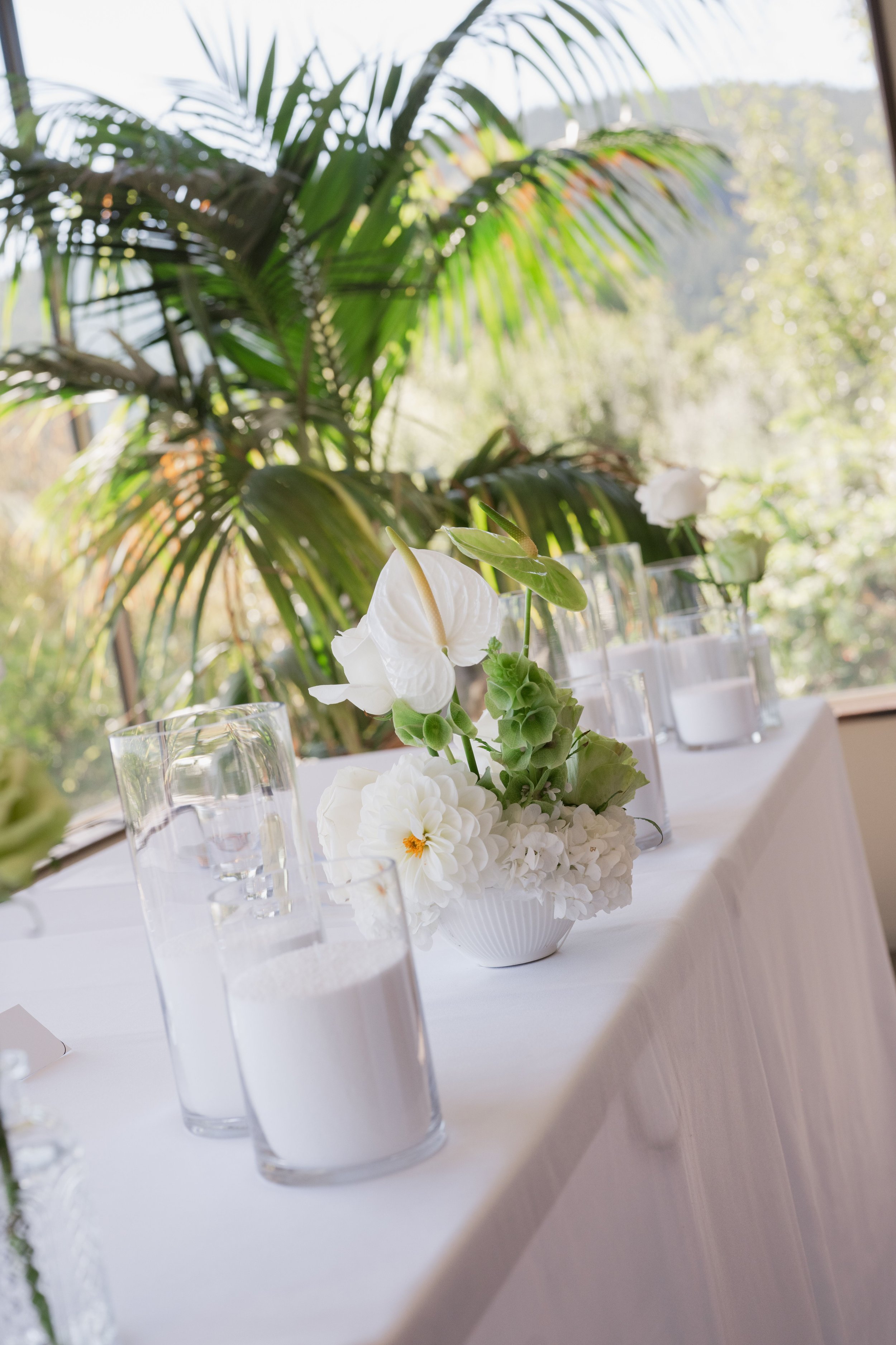 White and green wedding table flowers