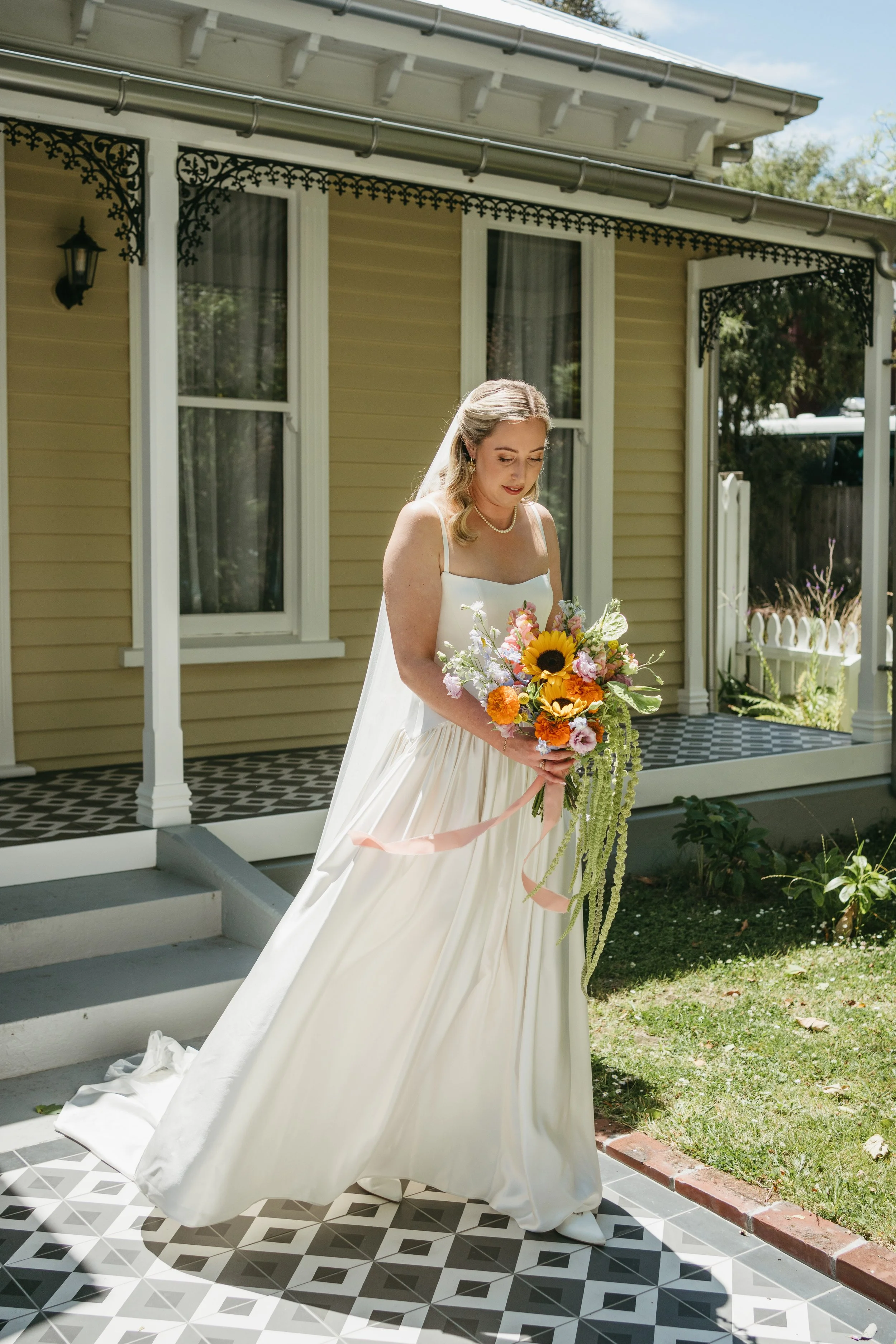 Bright sunflower wedding bouquet 70's wedding inspiration