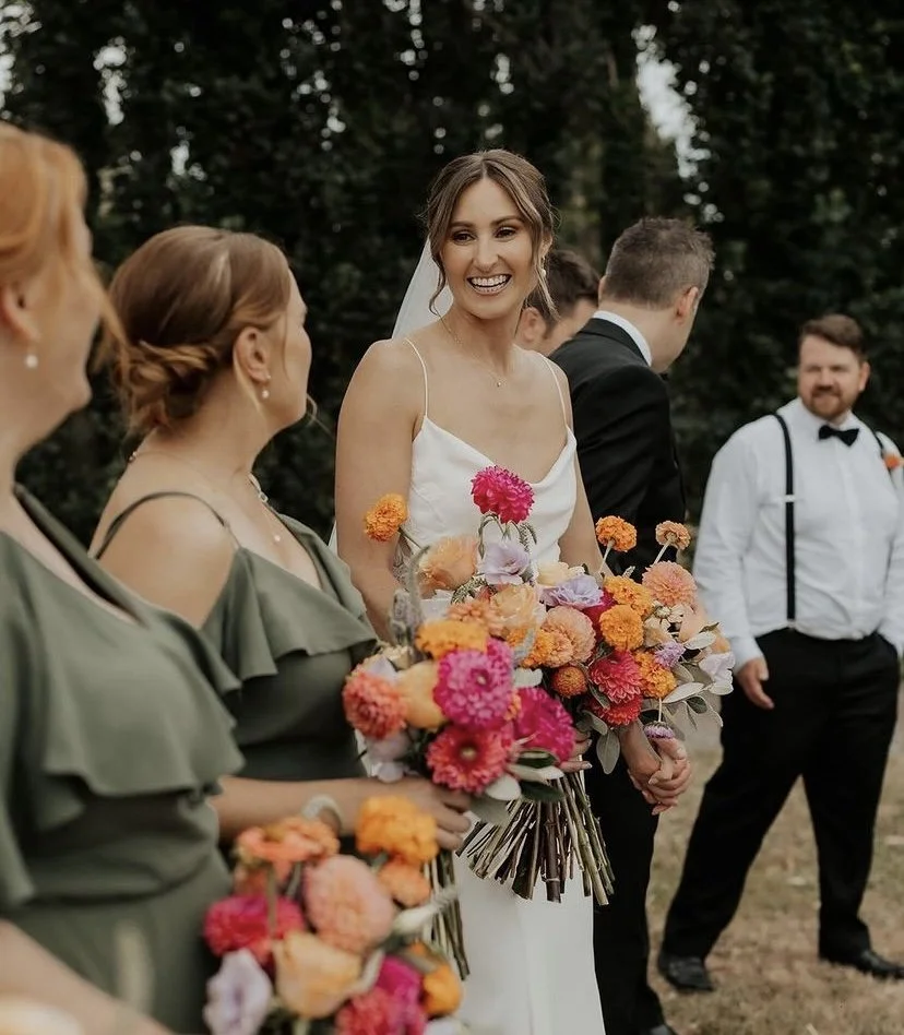bright pink and orange wedding bouquet