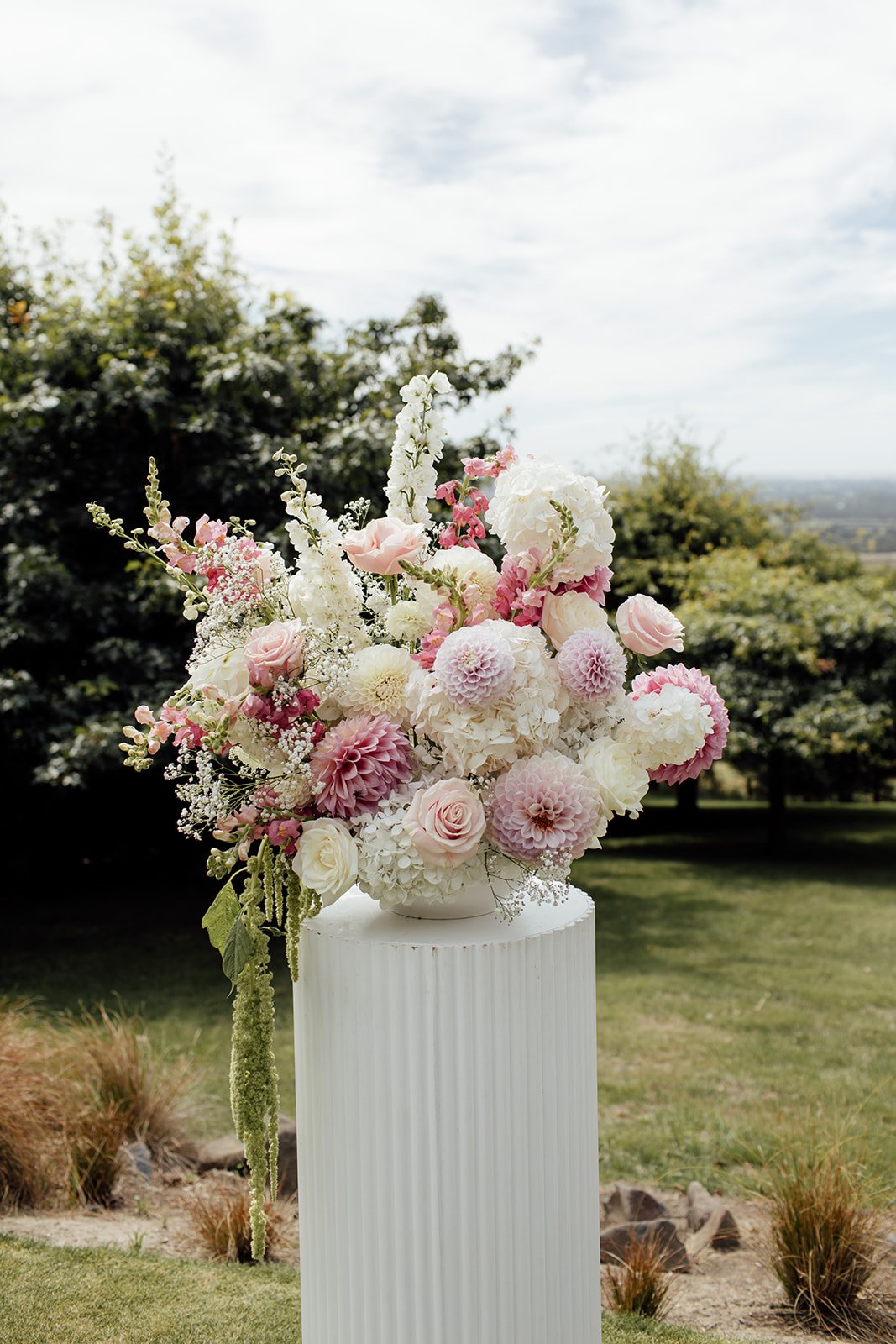 Pink and white wedding plinths