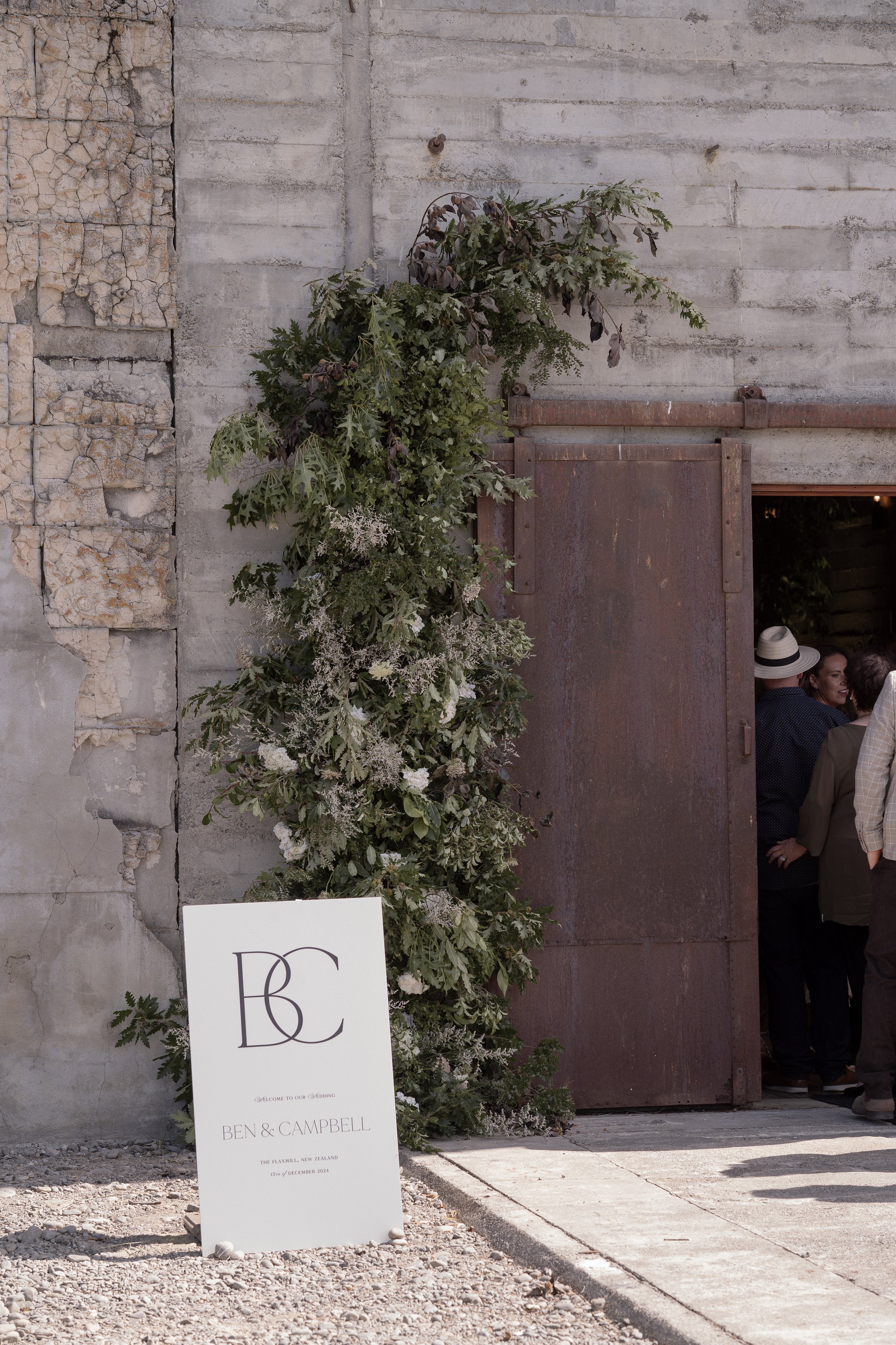 greenery wedding floral pillars installation