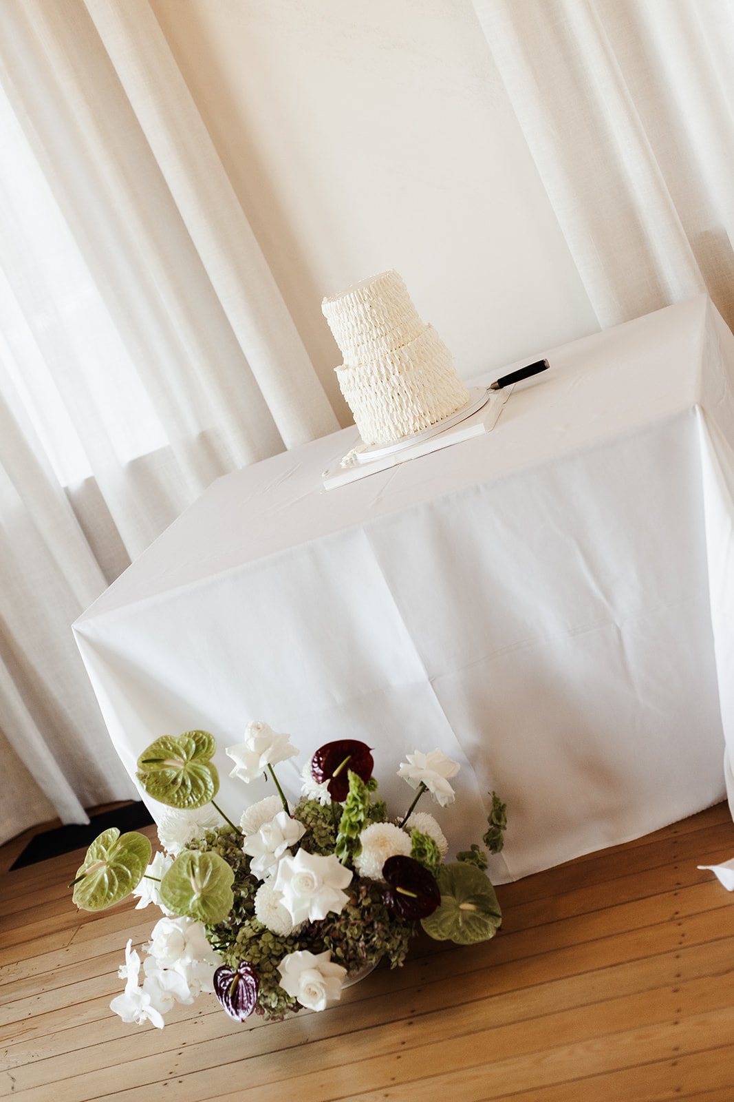 Dark red white and green cake flowers