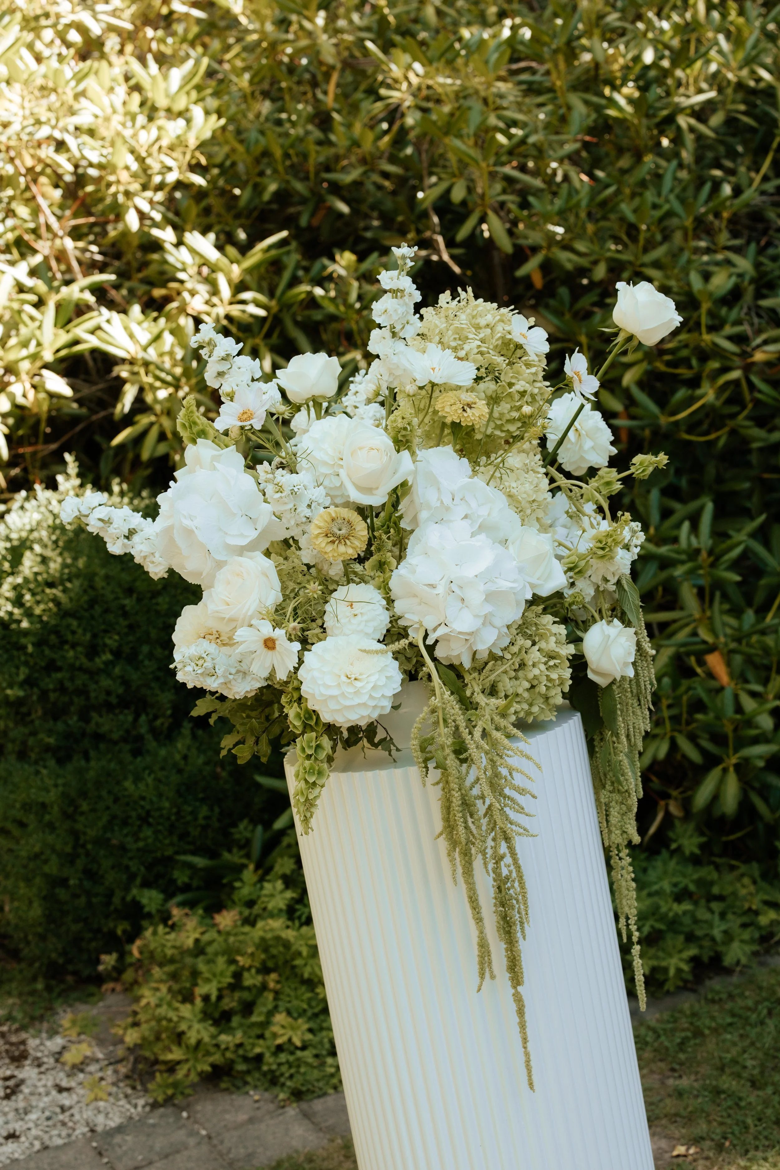 White and green wedding plinths