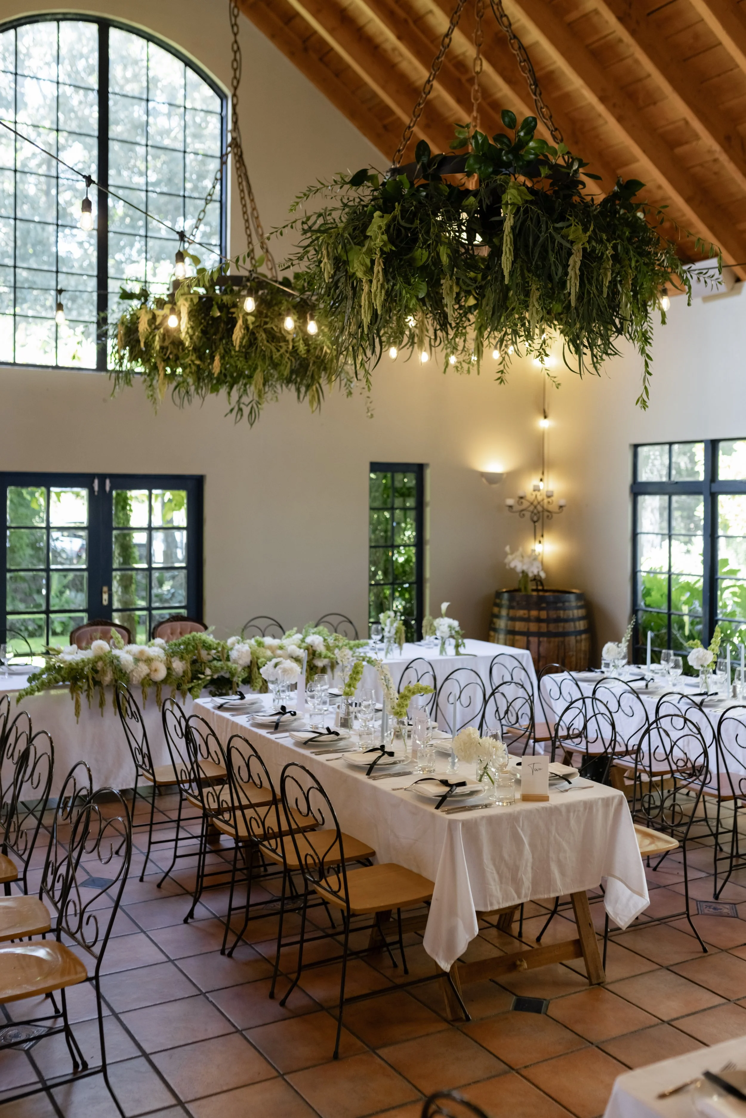 Green flower wedding chandelier installation