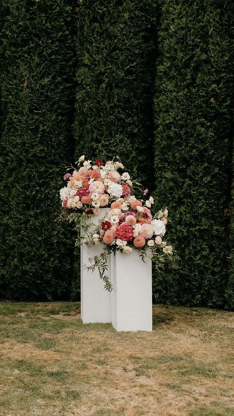 Autumnal pink and orange wedding plinths 