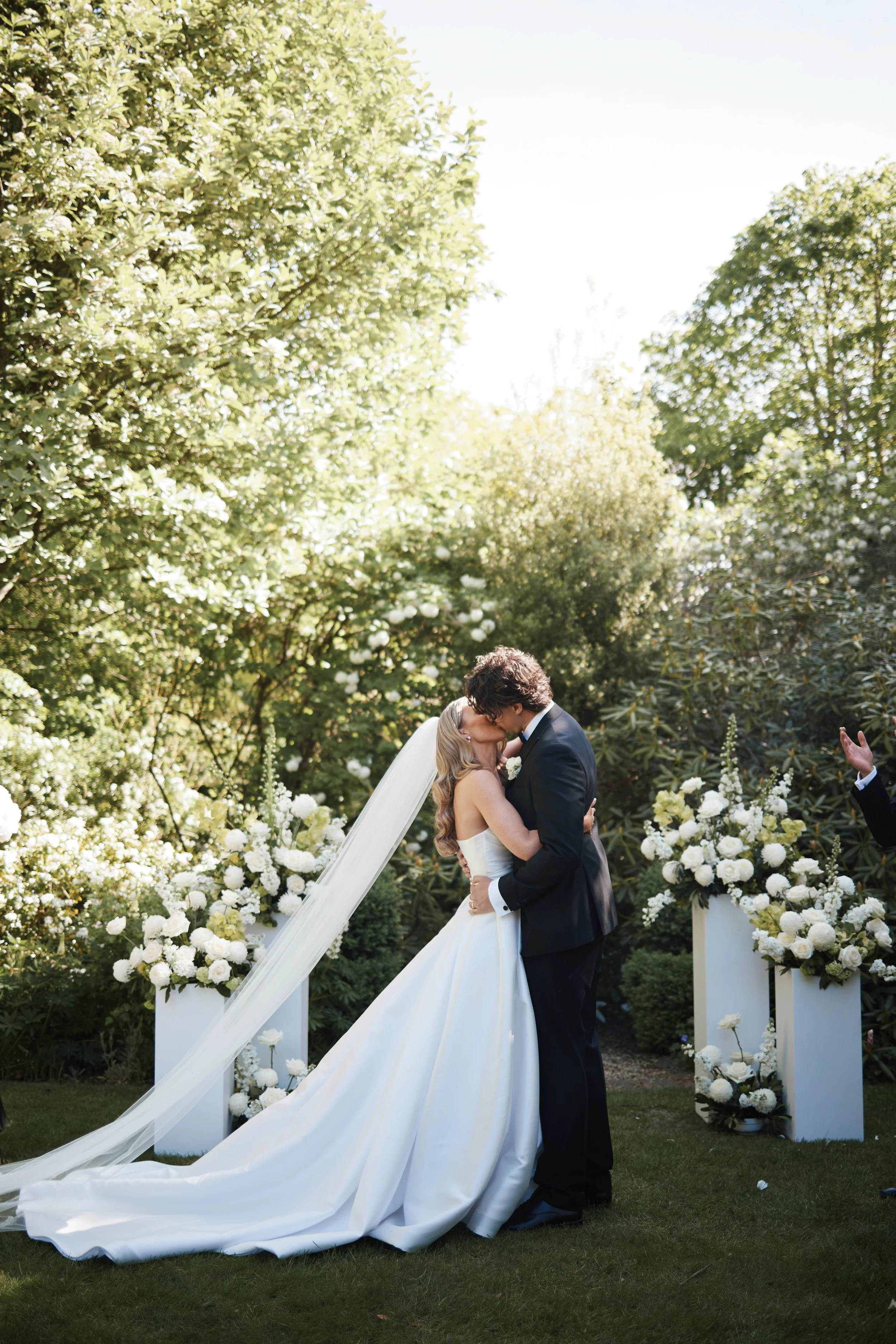 white and green floral plinths