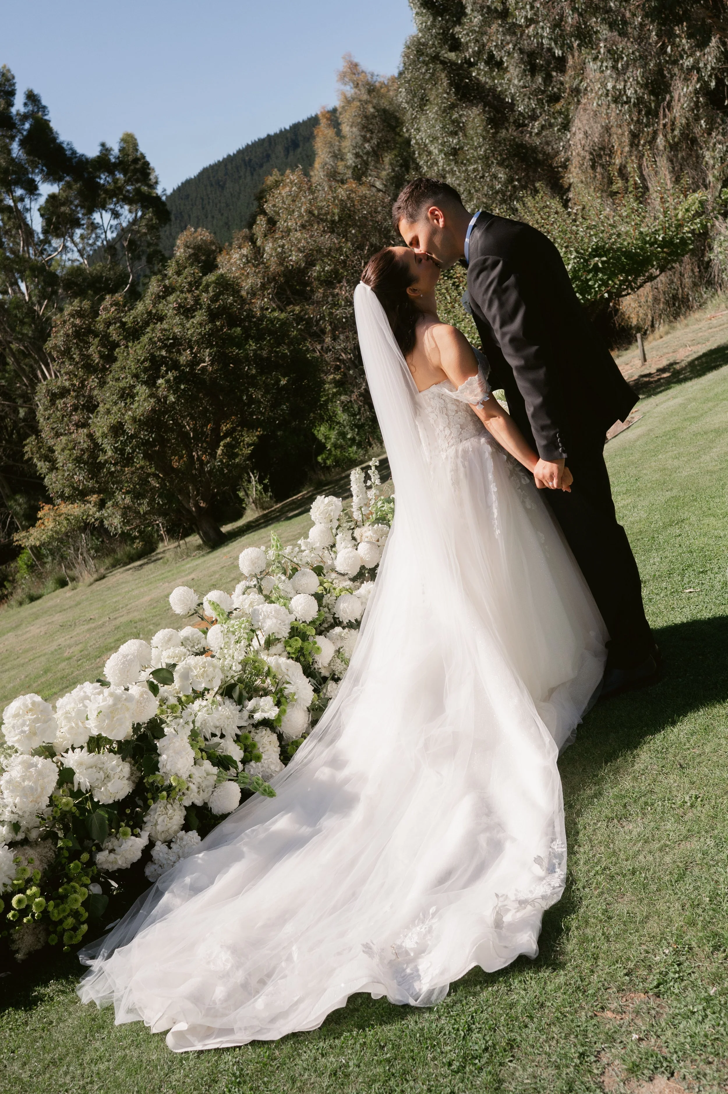 White and green luxury wedding floral installation
