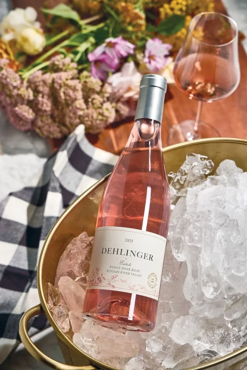 Dehlinger 2025 Rose wine bottle in ice bucket on decorated table