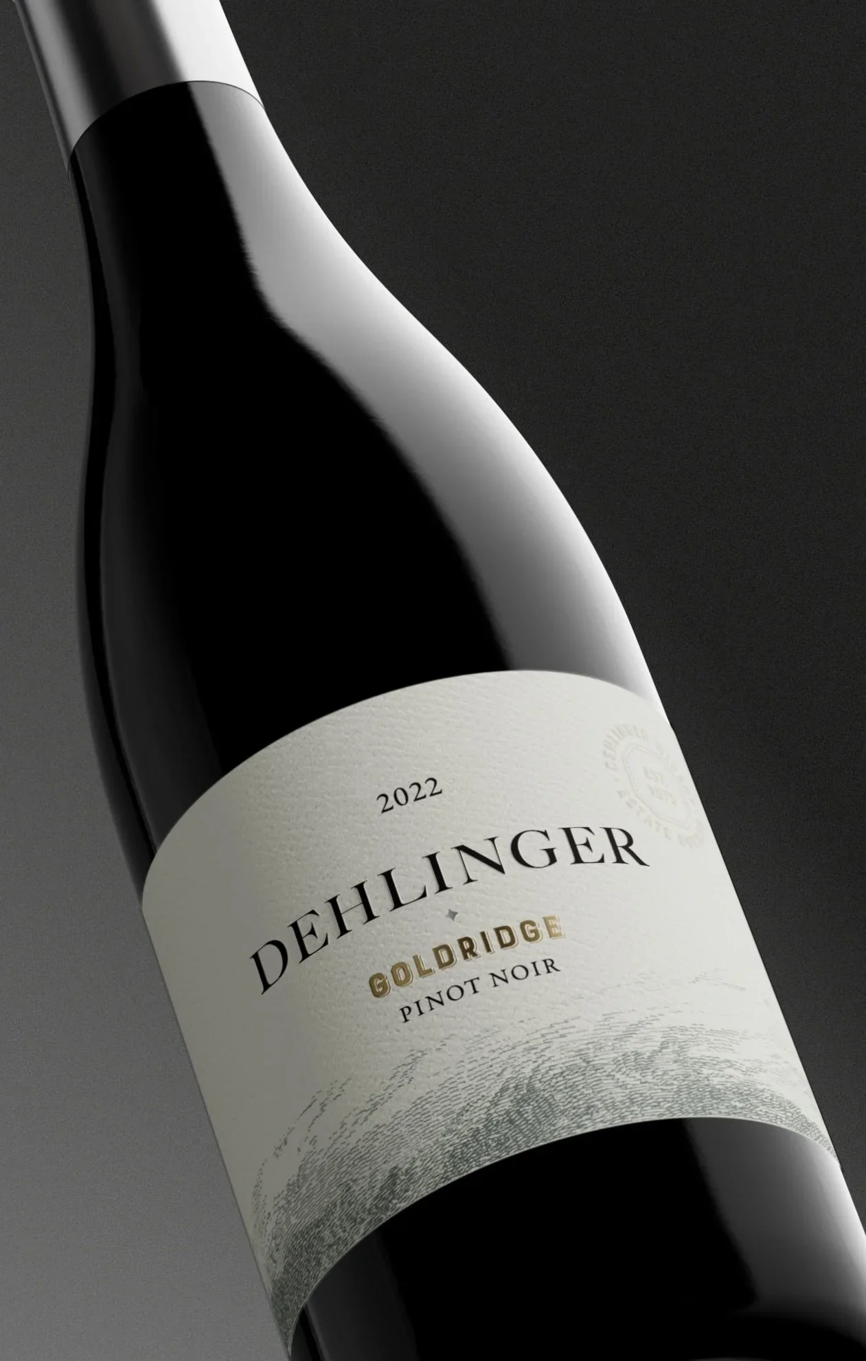 Close-up of a bottle of Dehlinger Goldridge Pinot Noir wine from 2022, with a black and white label.