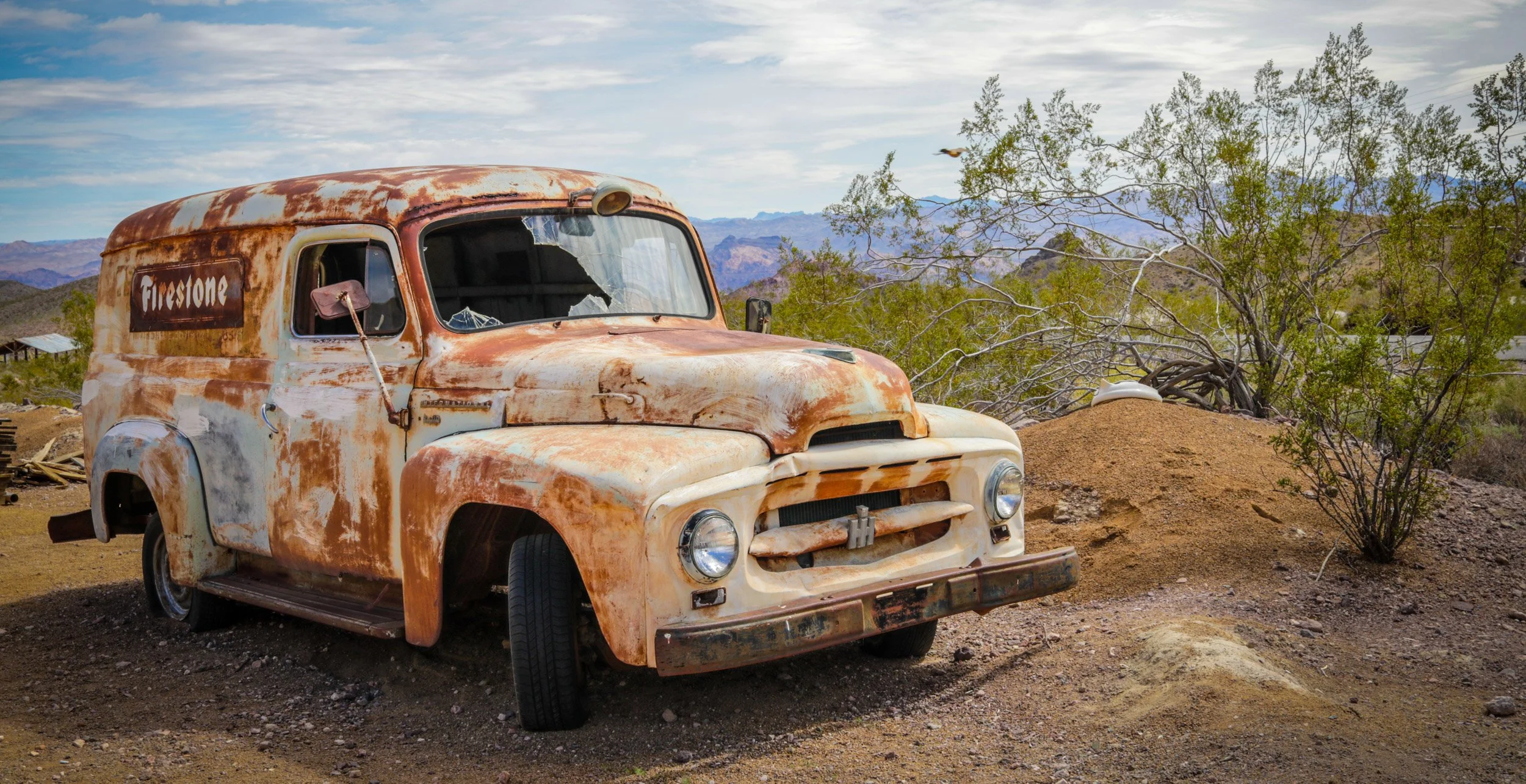 vintage-rusty-truck-desert-landscape-ghost-town-nevada.jpg