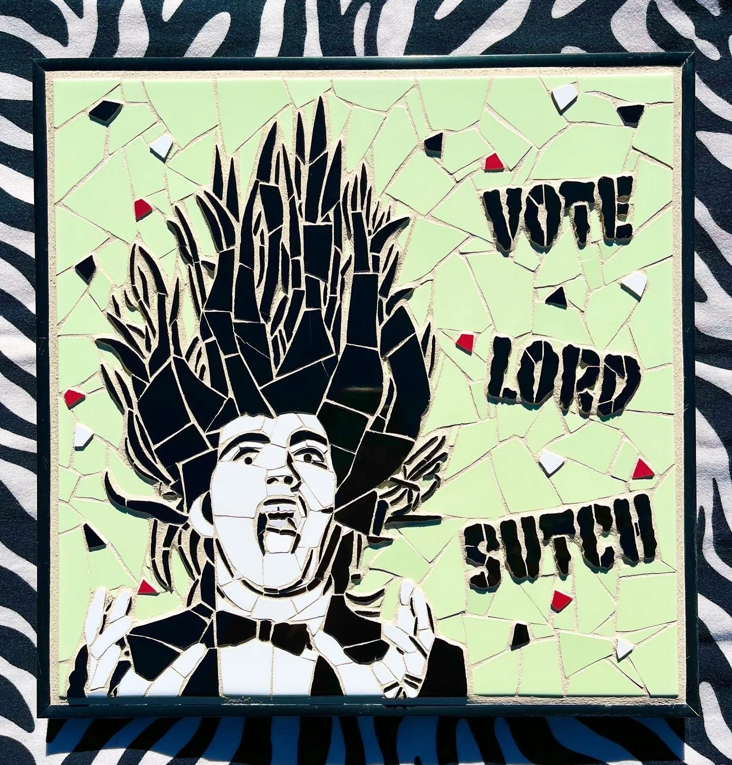Lord Sutch. Ceramic tiles on glass. 13"x13". 2022