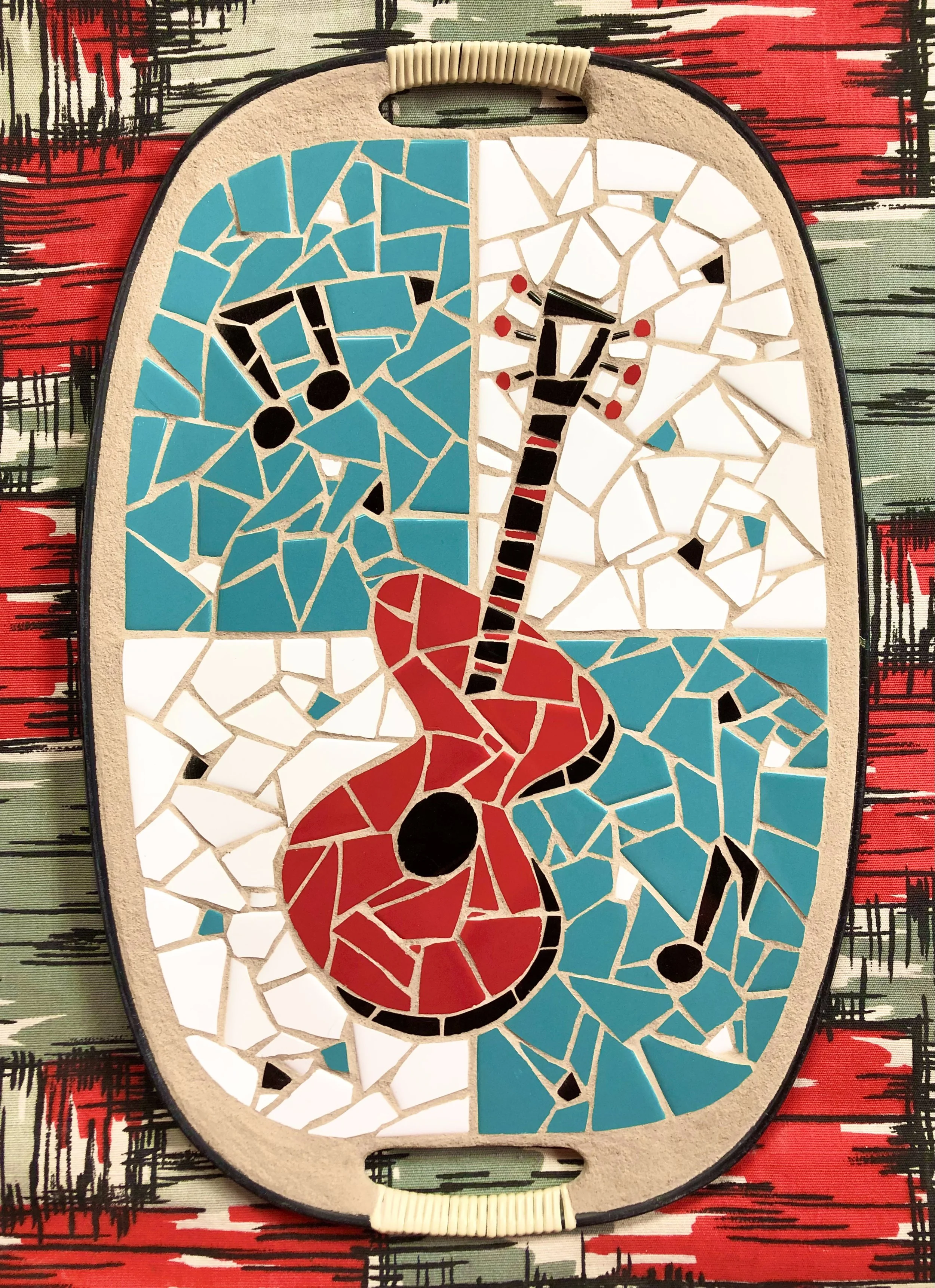 Guitar. Ceramic tiles on Masonite tray. 18"x12". 2021