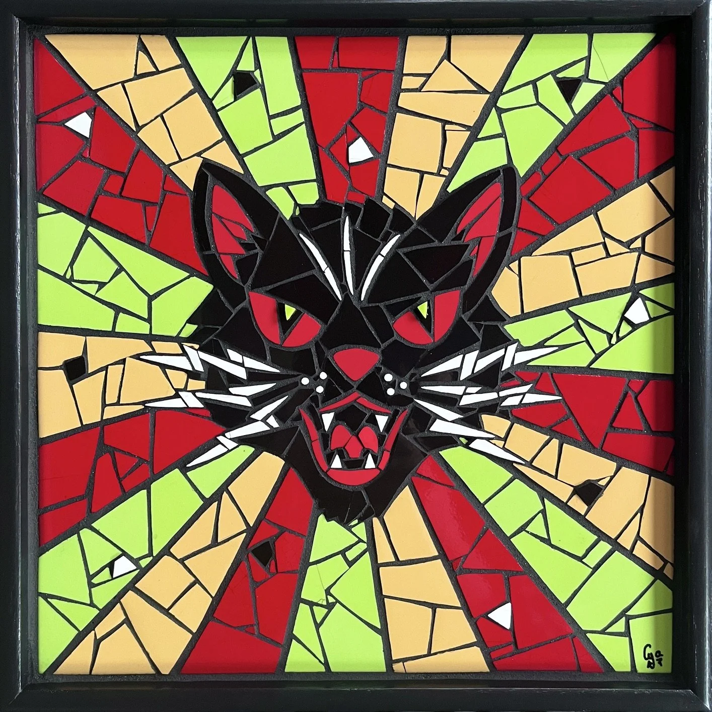 Mean cat. Ceramic tiles and stained glass on wood. 12"x12". 2026