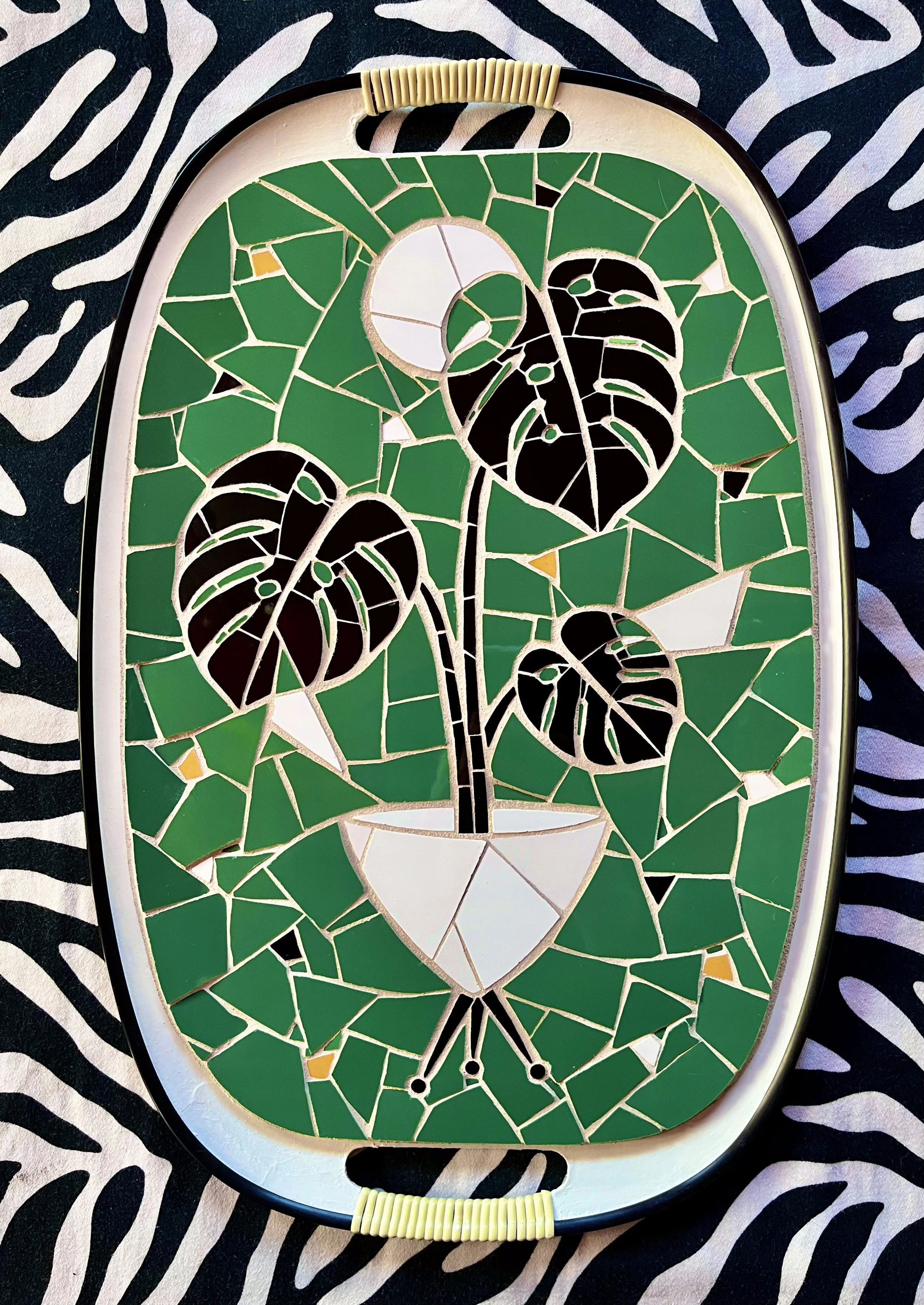 Monstera. commission. Ceramic tiles on tray. 18"x12". 2023