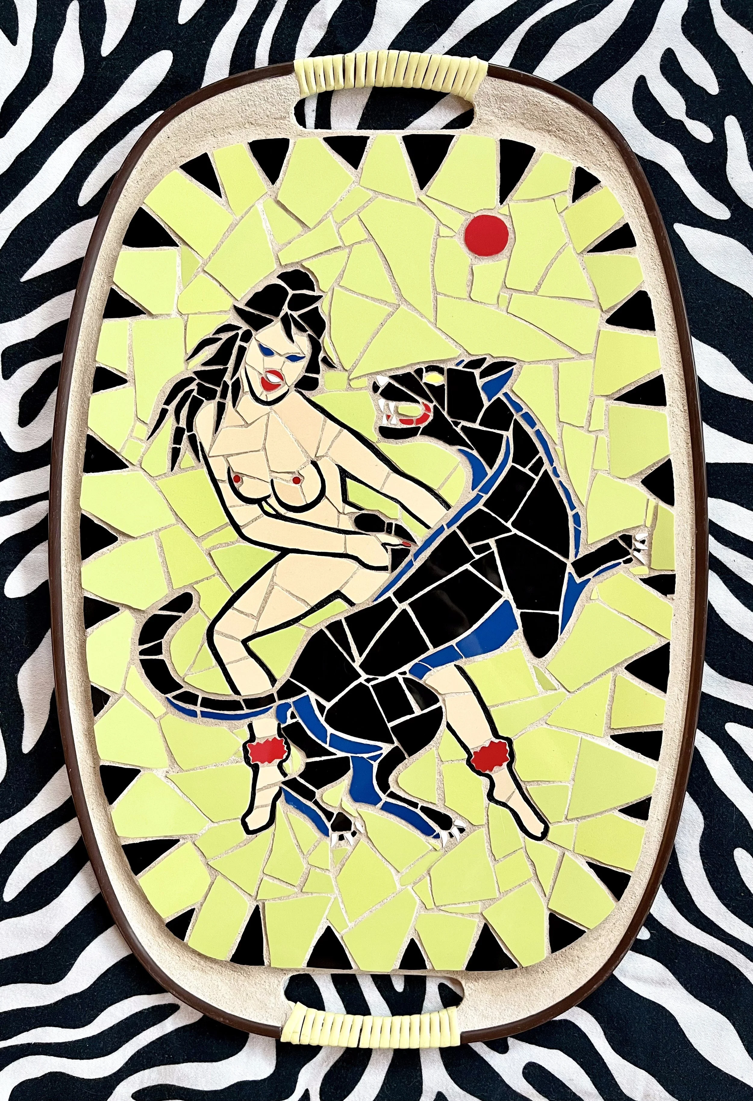 Panther girl. Ceramic tiles on Masonite tray. 18"x12". 2022