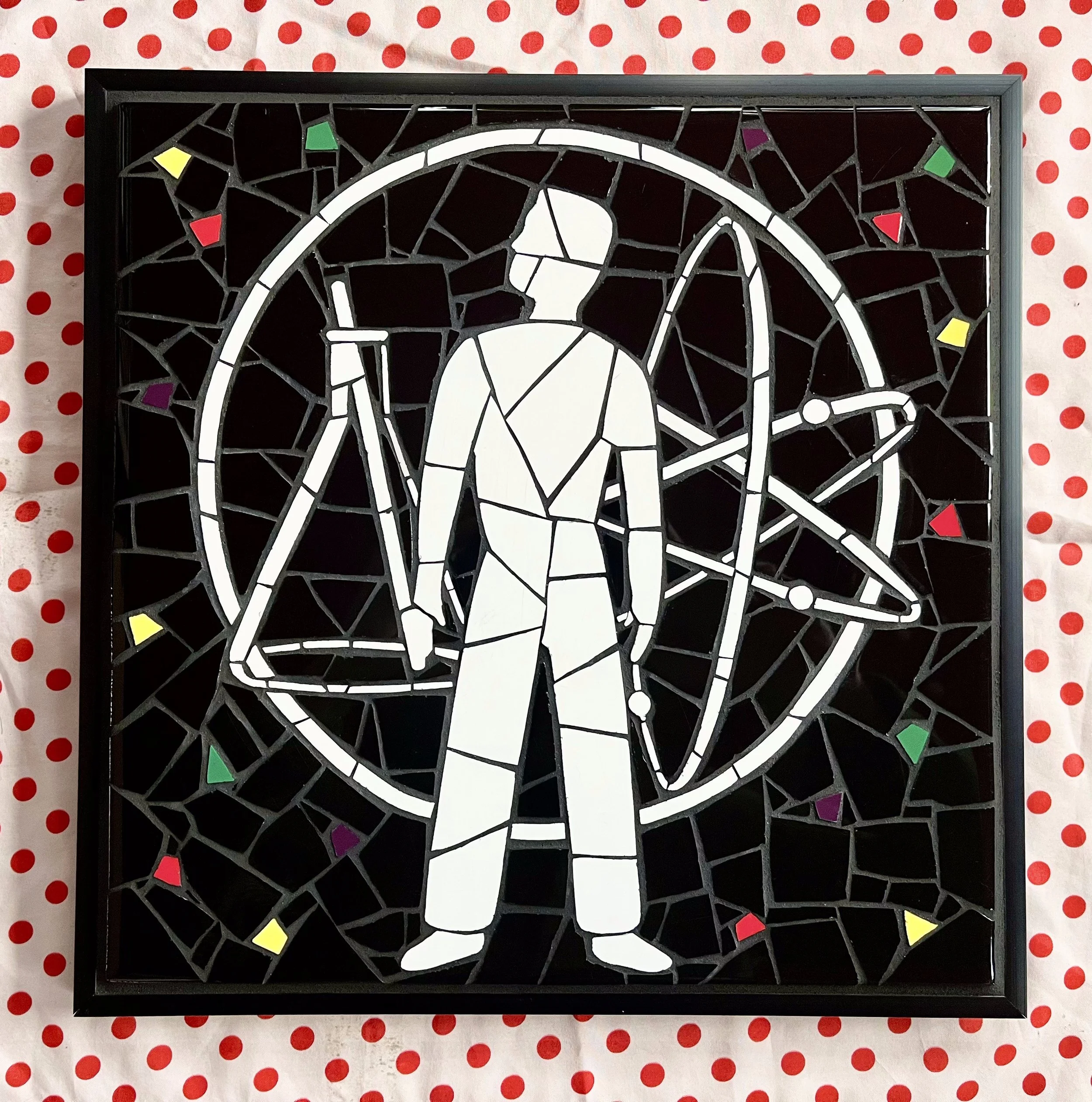 Devo. Ceramic tiles on glass. 13"x13". 2024