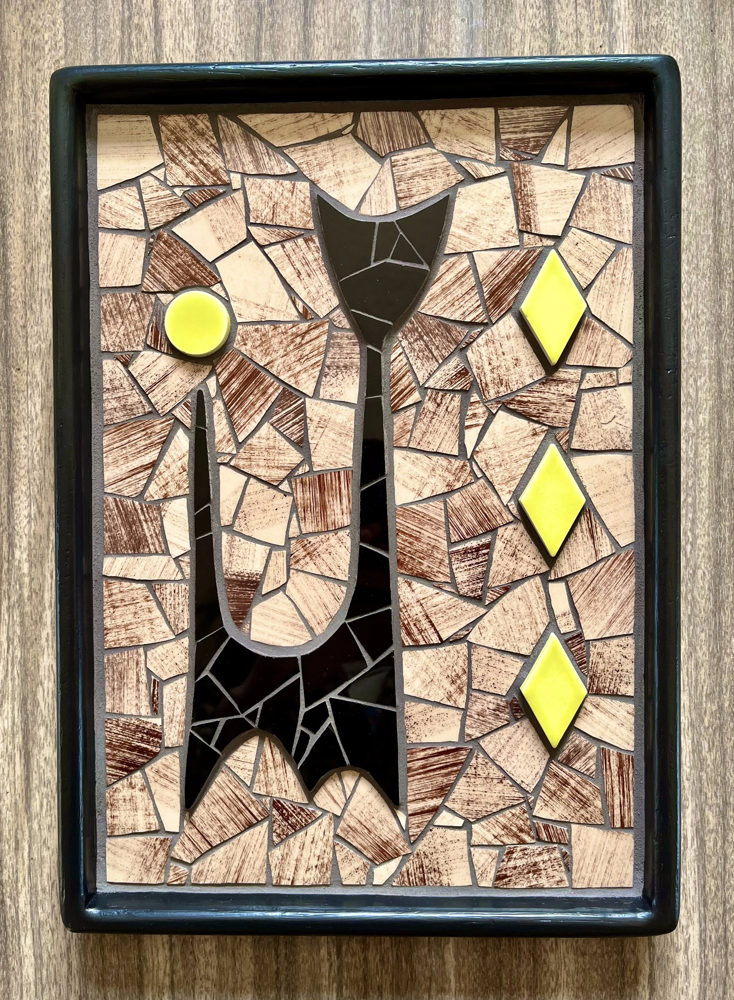 MCM cat. Ceramic tiles and plates on wood. 14"x10". 2025