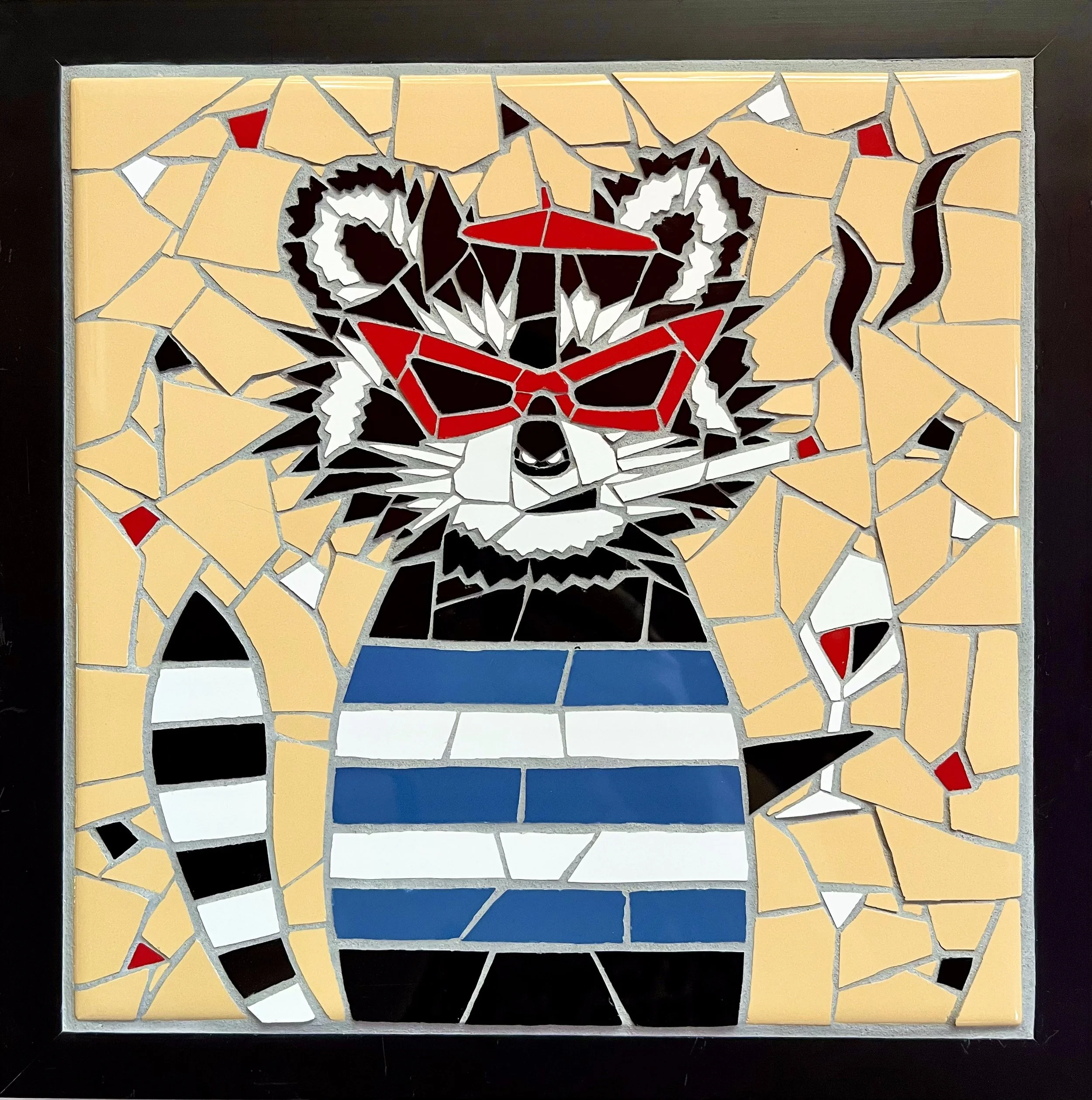 Raccoon. Ceramic tiles on wood. 12"x12". 2023