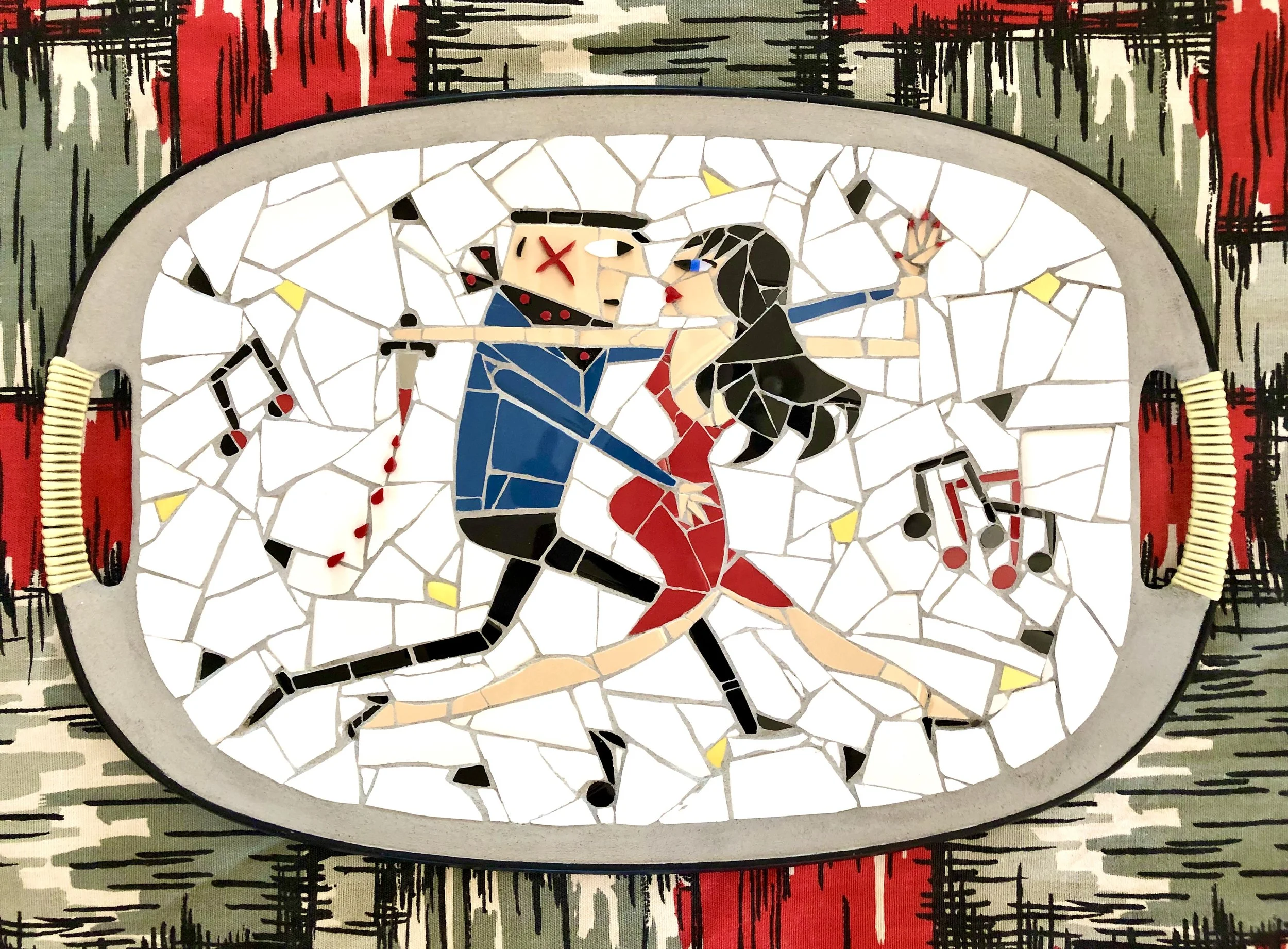 Killer dancers. Ceramic tiles on Masonite tray. 18"x12". 2020