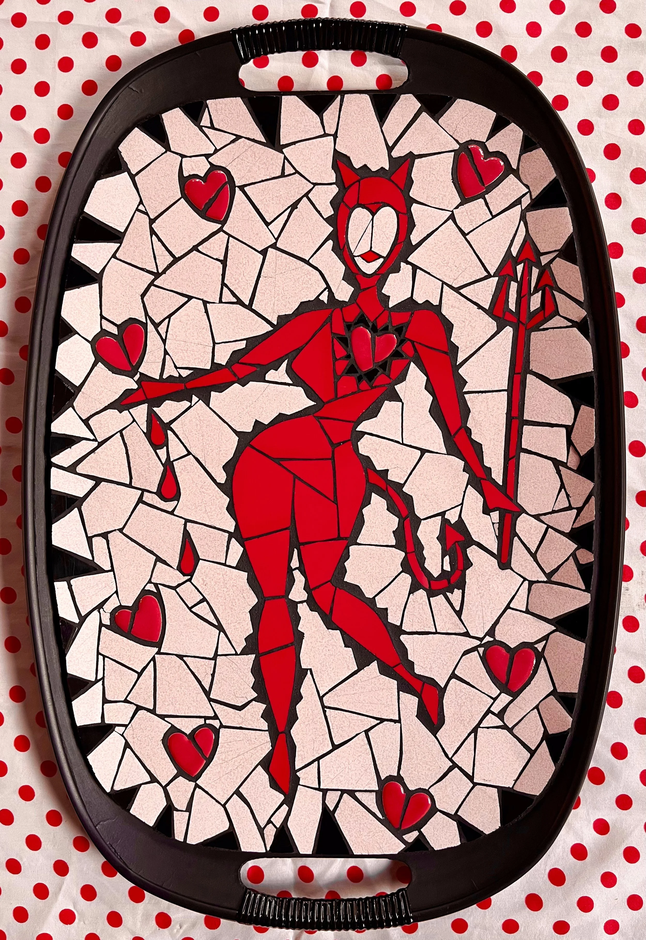 Devilette. Ceramic tiles on Masonite tray. 18"x12". 2024
