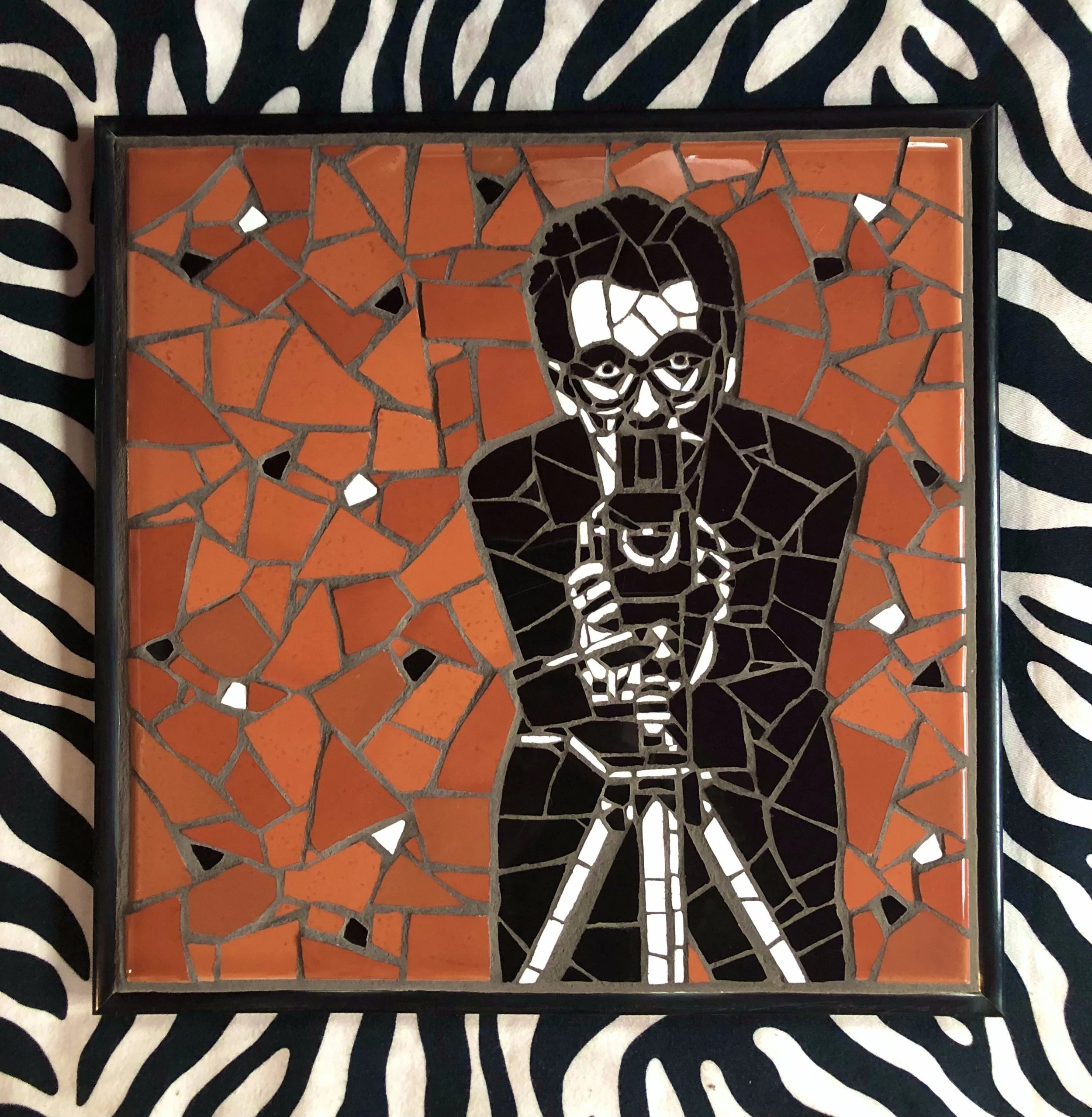 Elvis Costello. Ceramic tiles on glass. 13"x13". 2021