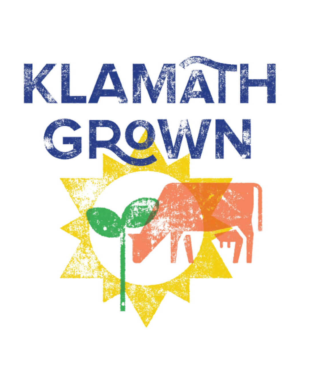 Text reading 'Klamath Grown' with a graphic of a pink cow, a yellow star, and green leaves.
