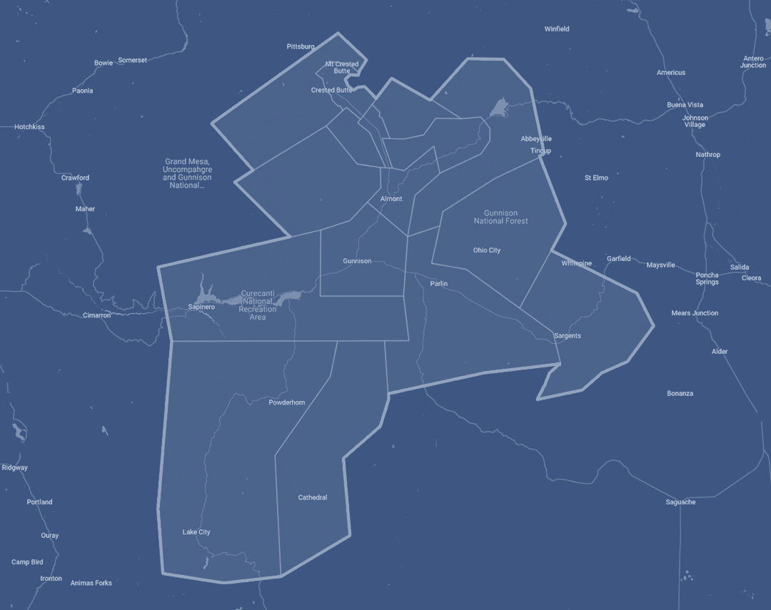 Map of Gunnison County region with outlined districts and labeled towns and national parks.
