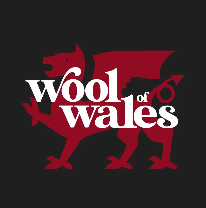 Logo with a red Welsh dragon on a black background, overlayed with the white text 'Wool of Wales'.